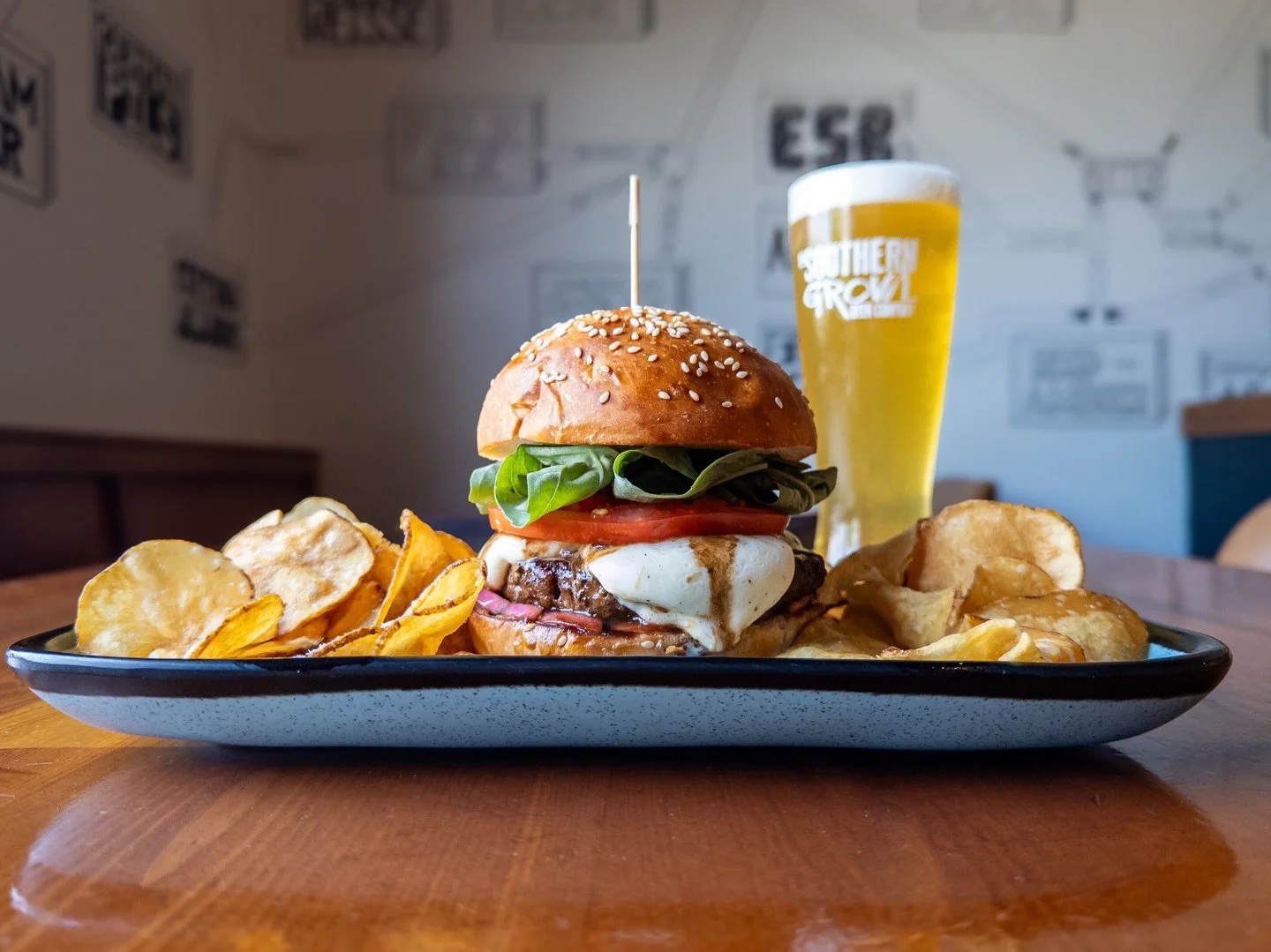 Weekly Sandwich Special:
MAMMA MIA BURGER
topped with fresh mozzarella, fresh basil, tomato, pickled onions, and balsamic glaze on a house bun. 
Pair with NZ PILS, pilsner with New Zealand hops available on draft now. 

Sandwich Special available thr