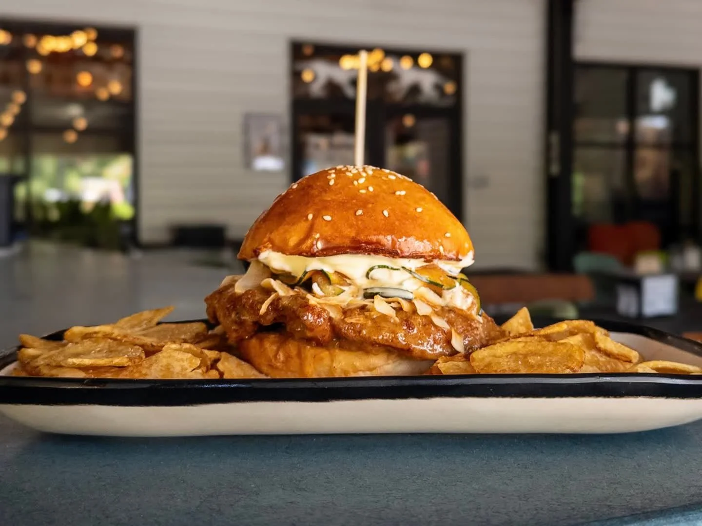 ISLAND SPICE CHICKEN SANDWICH
panko crusted chicken breast topped with spicy coconut sauce, mango zucchini kimchi, and orange passionfruit aioli on a house bun. 
Pair with NZ PILS, pilsner with New Zealand hops available on draft now. 

Island Spice 