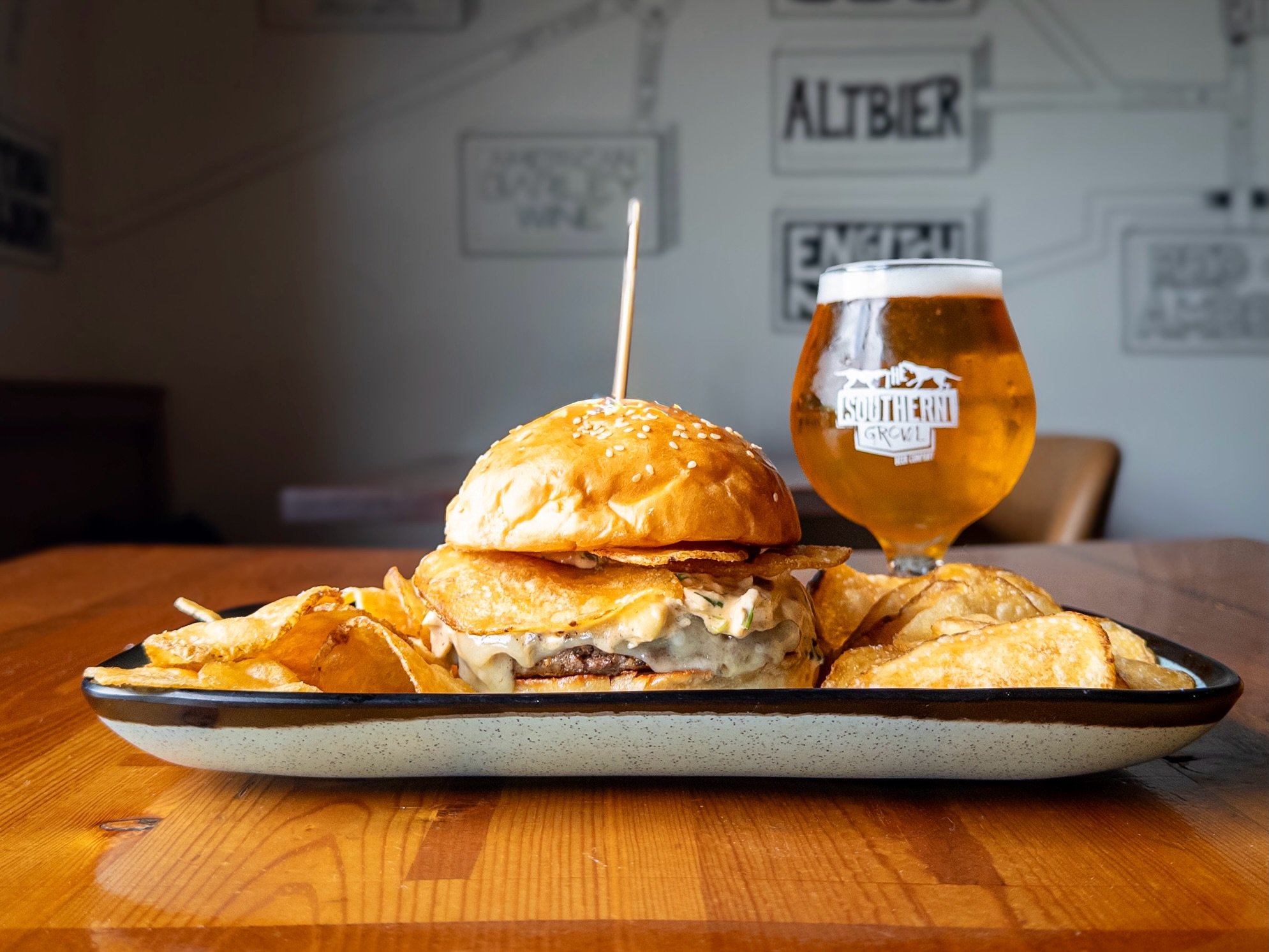 Weekly Sandwich Special:
CHIP DIP BURGER
topped with chipotle spinach and artichoke spread, potato chips, and Swiss cheese on a house bun. 
Pair with GR&Ouml;WL K&Ouml;LSCH, available on draft and in 16oz cans to-go. 

Sandwich Special available ever