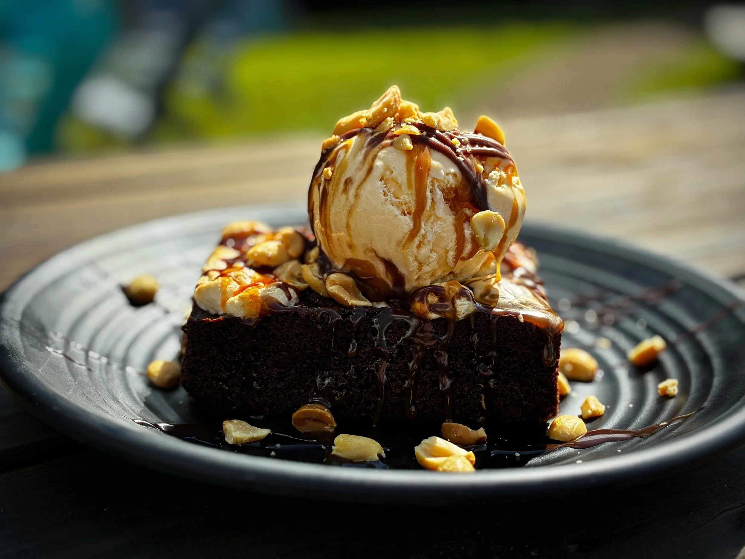 PEANUT BUTTER MARSHMALLOW SWIRL BROWNIE SUNDAE topped with ice cream, caramel sauce, fudge sauce, and roasted peanuts. 
Available through October during lunch, dinner, and brunch. 
Pair with 12th ANNIVERSARY IMPERIAL STOUT. Available on draft and in 