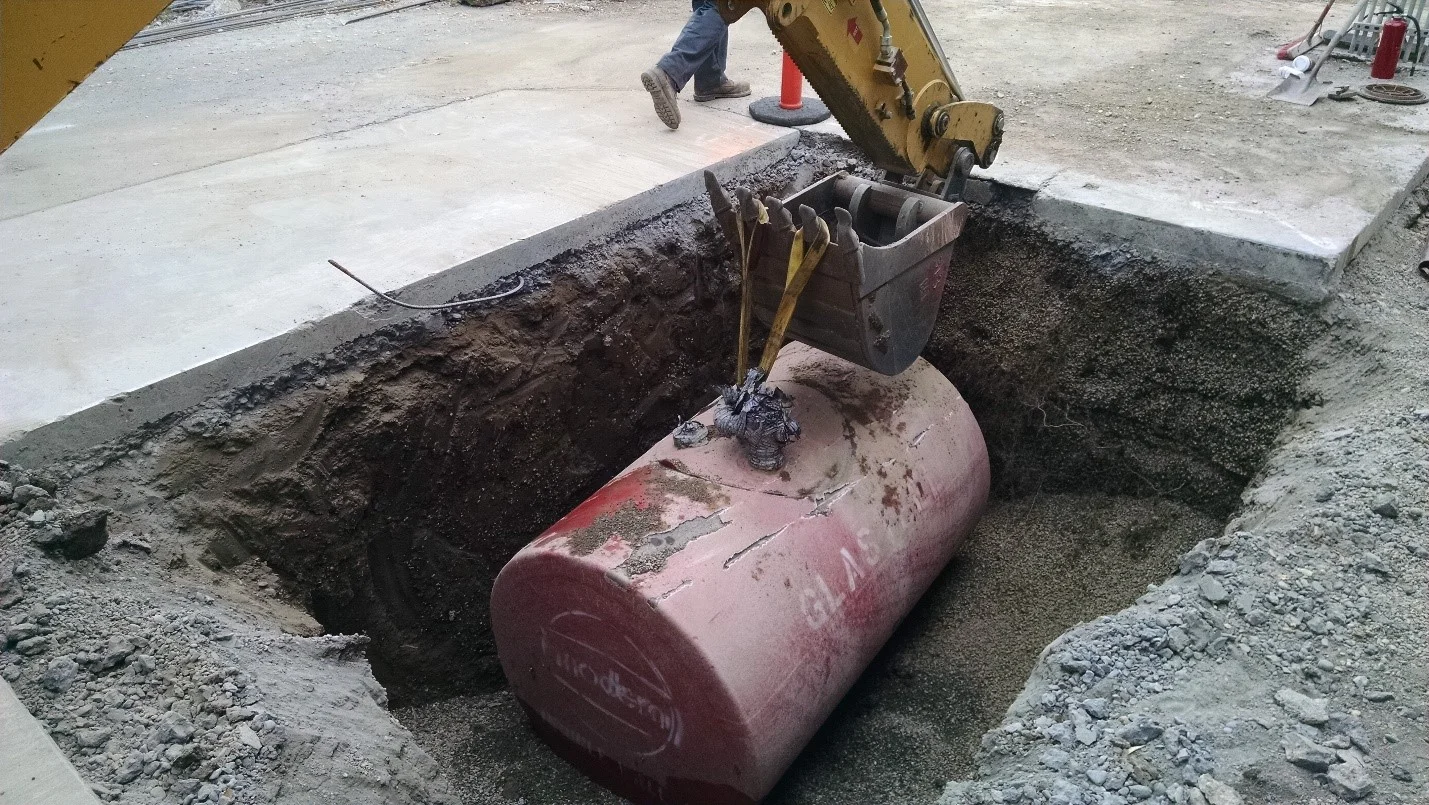 ust and hydraulic hoist removal
