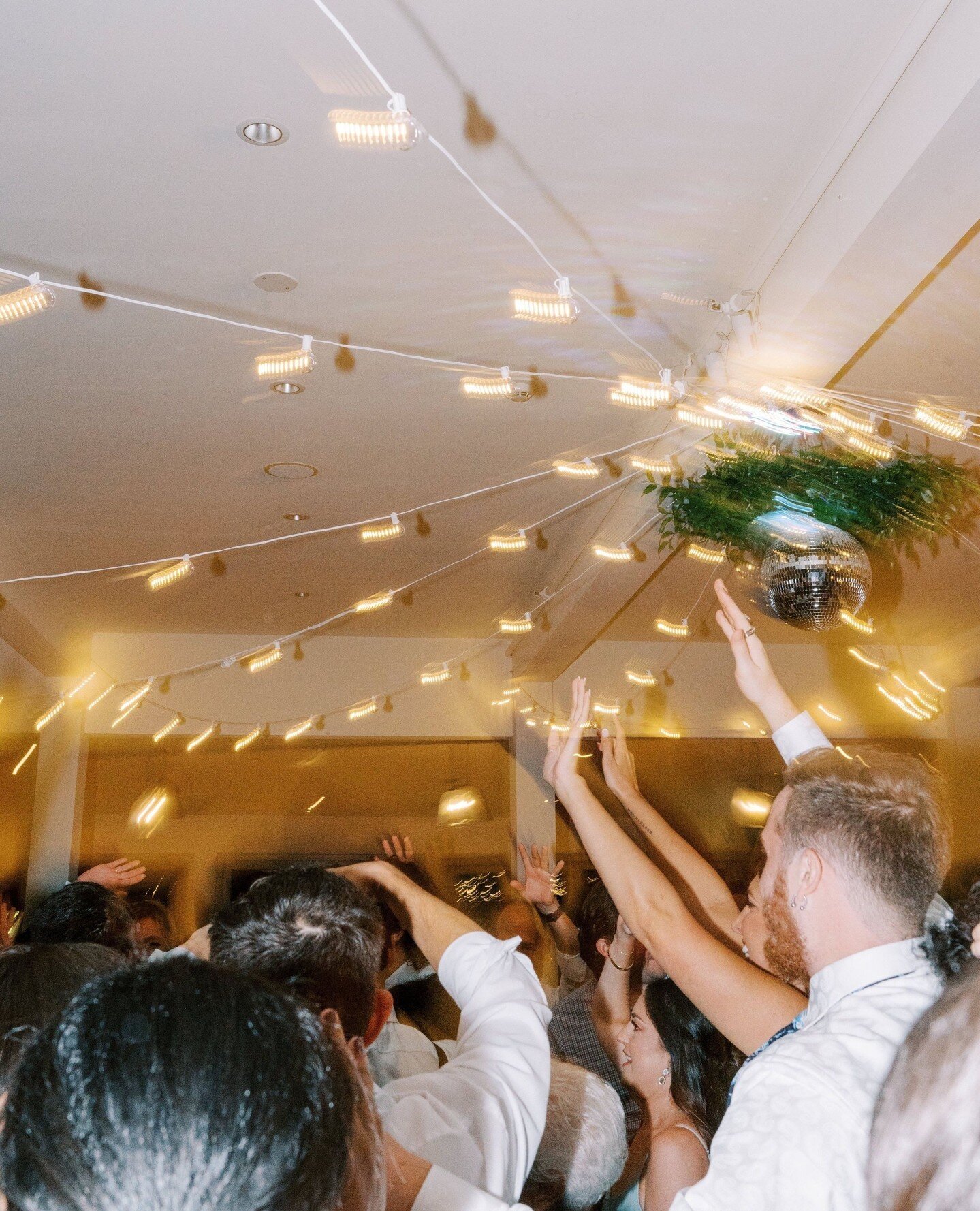 To more blurry nights under a disco ball in 2024!⁠
⁠
Venue @the_garrison⁠
Photography @haleyrichterphoto⁠
Lighting, Decor &amp; Florals @maple_field_floral⁠
⁠