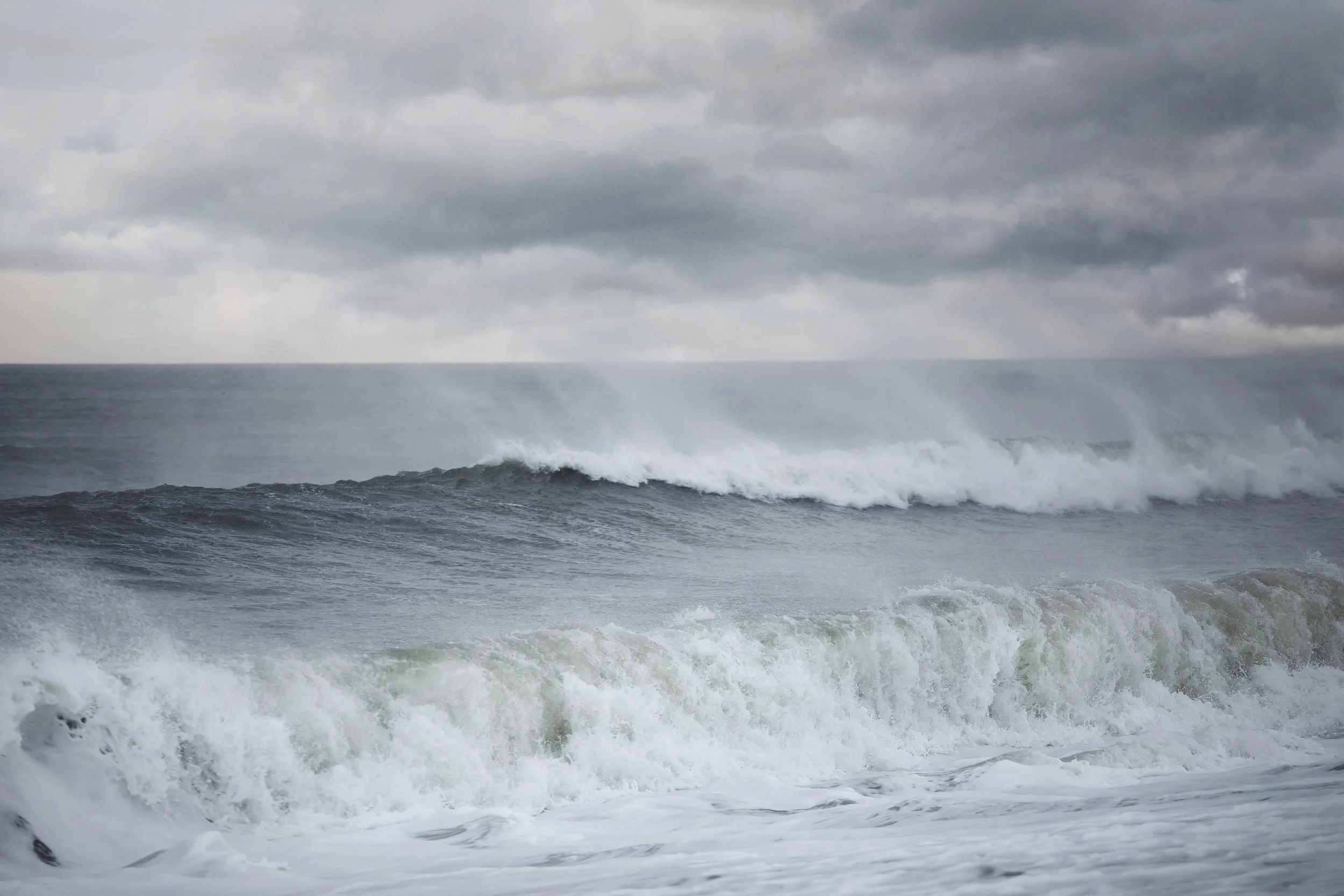 Beach photo, rough ocean waves before a storm