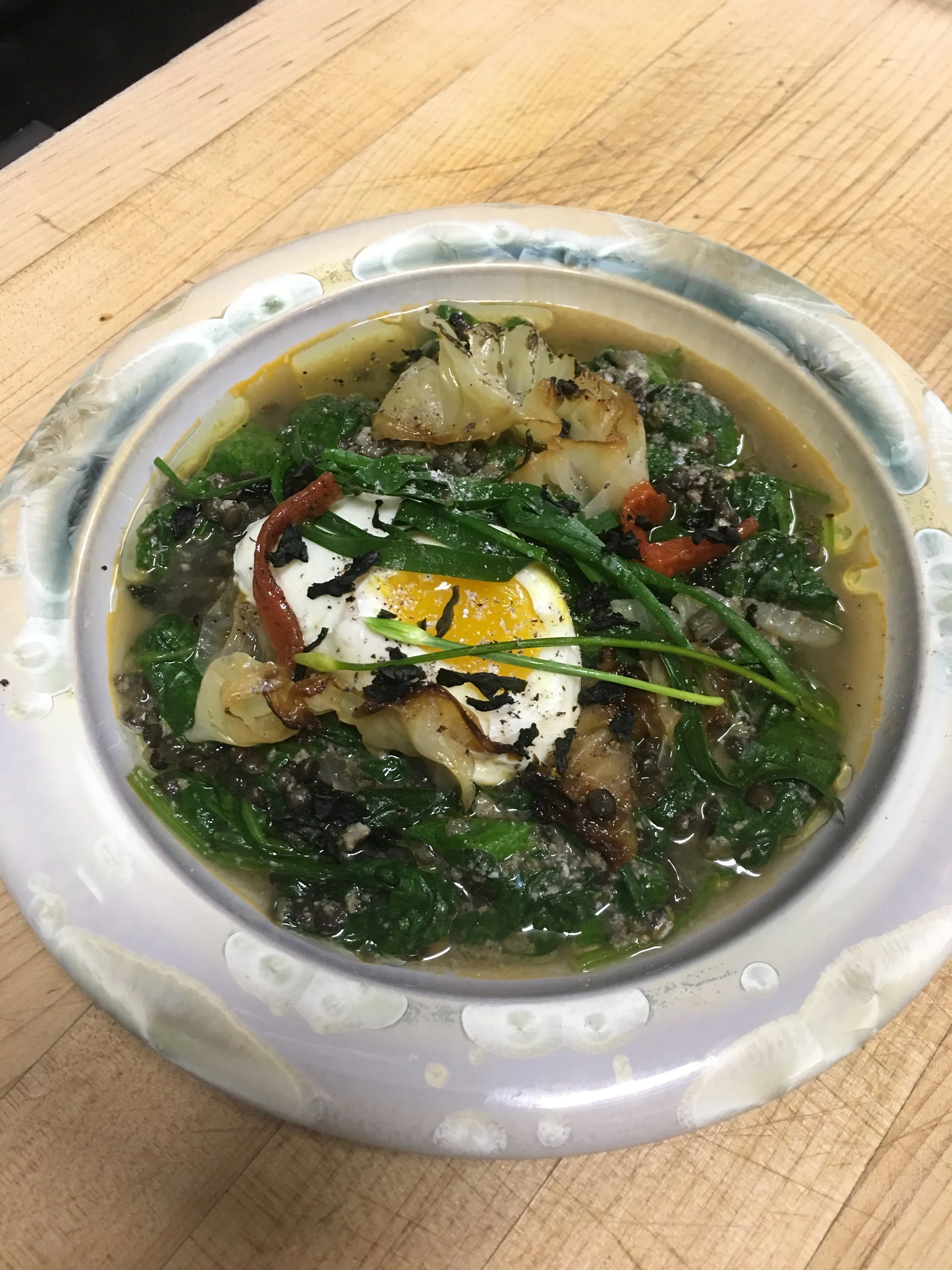 Black beluga lentils, charred cabbage, crispy seaweed, poached egg 