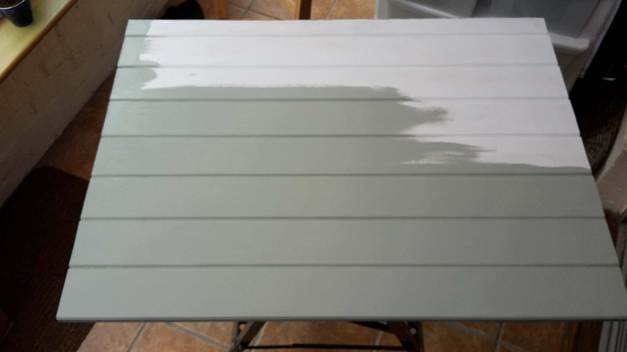 First coat of paint goes on