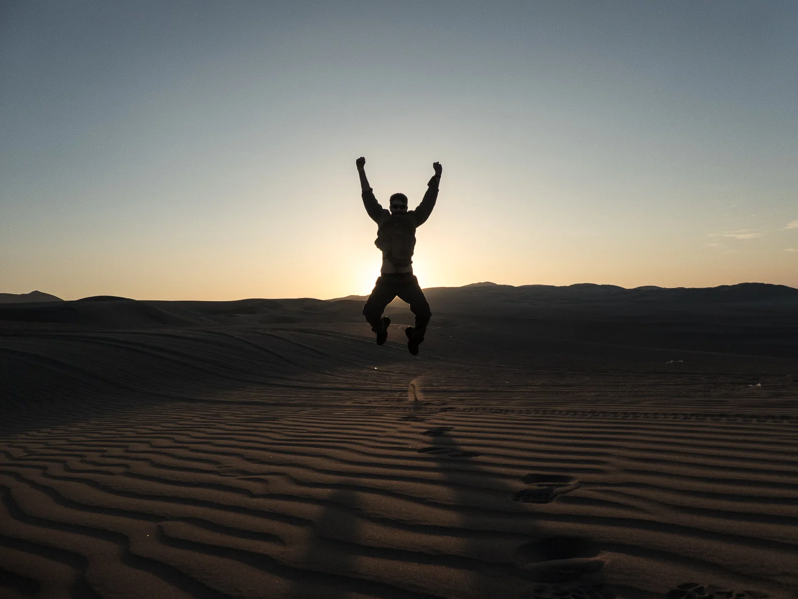 NEIL JUMPING FOR JOY IN HIS LAST PERUVIAN ADVENTURE
