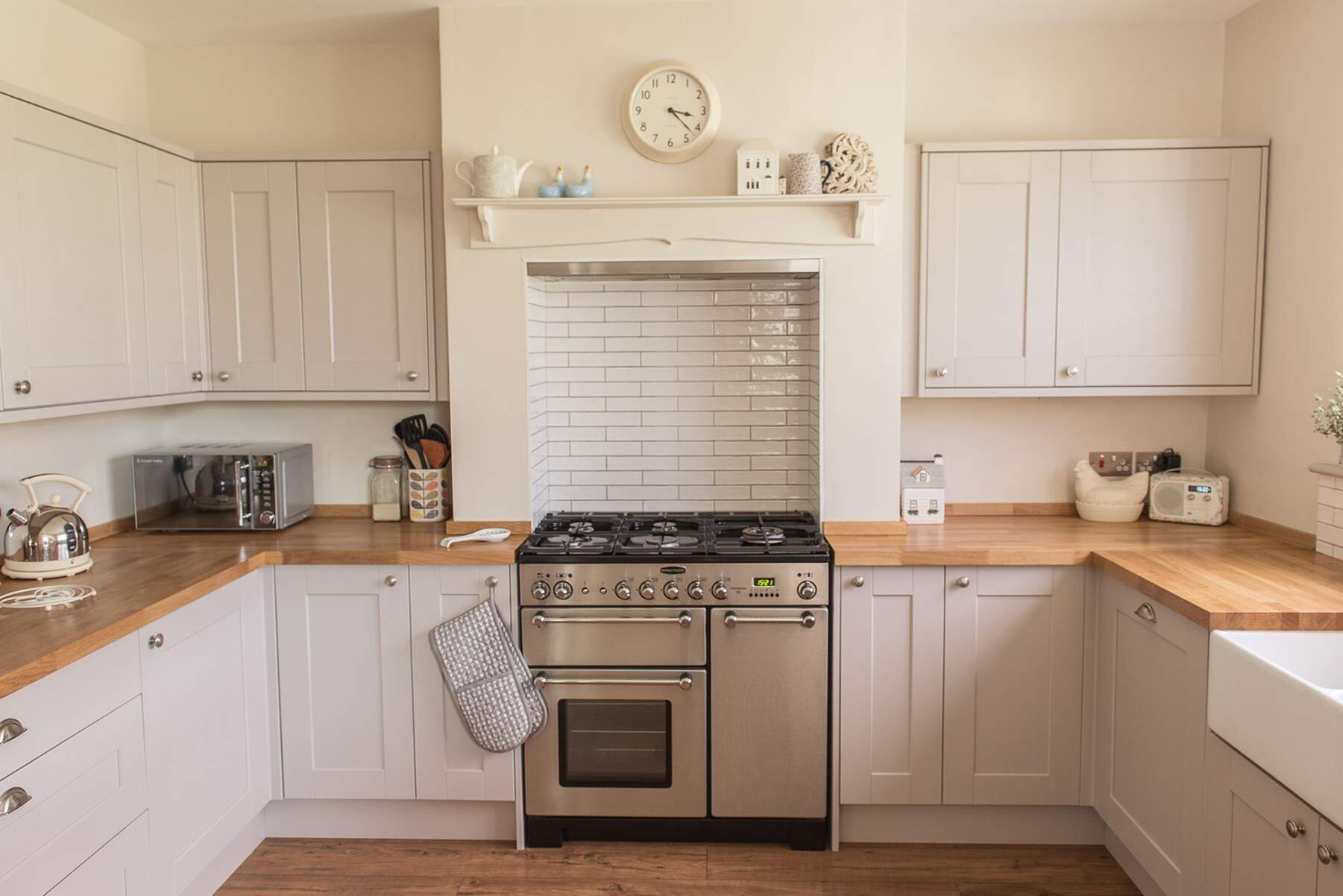 After image for kitchen renovation of recessed range cooker in  chimney breast