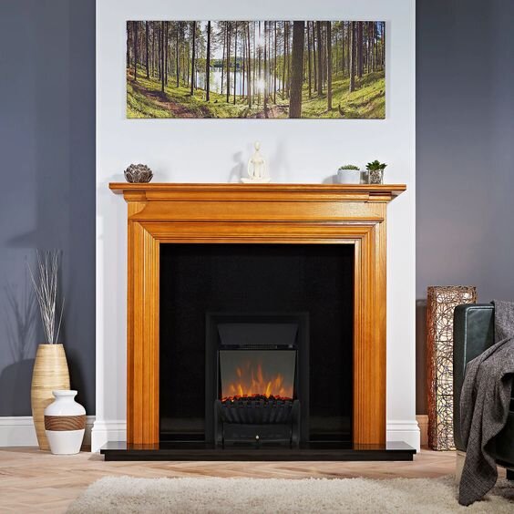 Electric open fire in wood surround - image: B&Q