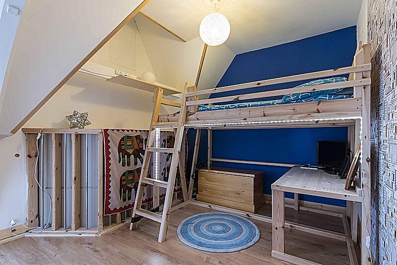 Former small bedroom – we will unblock those windows (behind the elephants and MDF) and this will become the stairs and landing upstairs. Image: McEwan Fraser