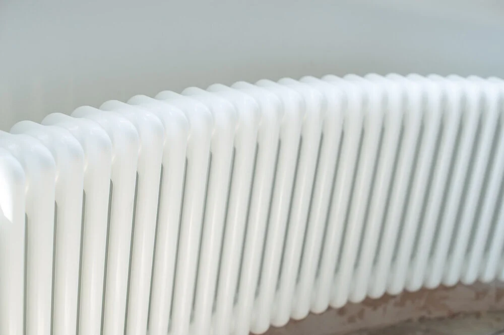 A curved radiator for a bay window | Fifi McGee