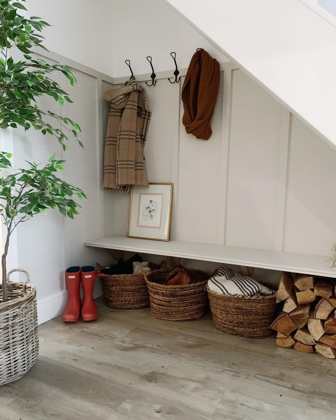 Under stair storage area for boots and coats - IMAGE: @my_best_laid_plans