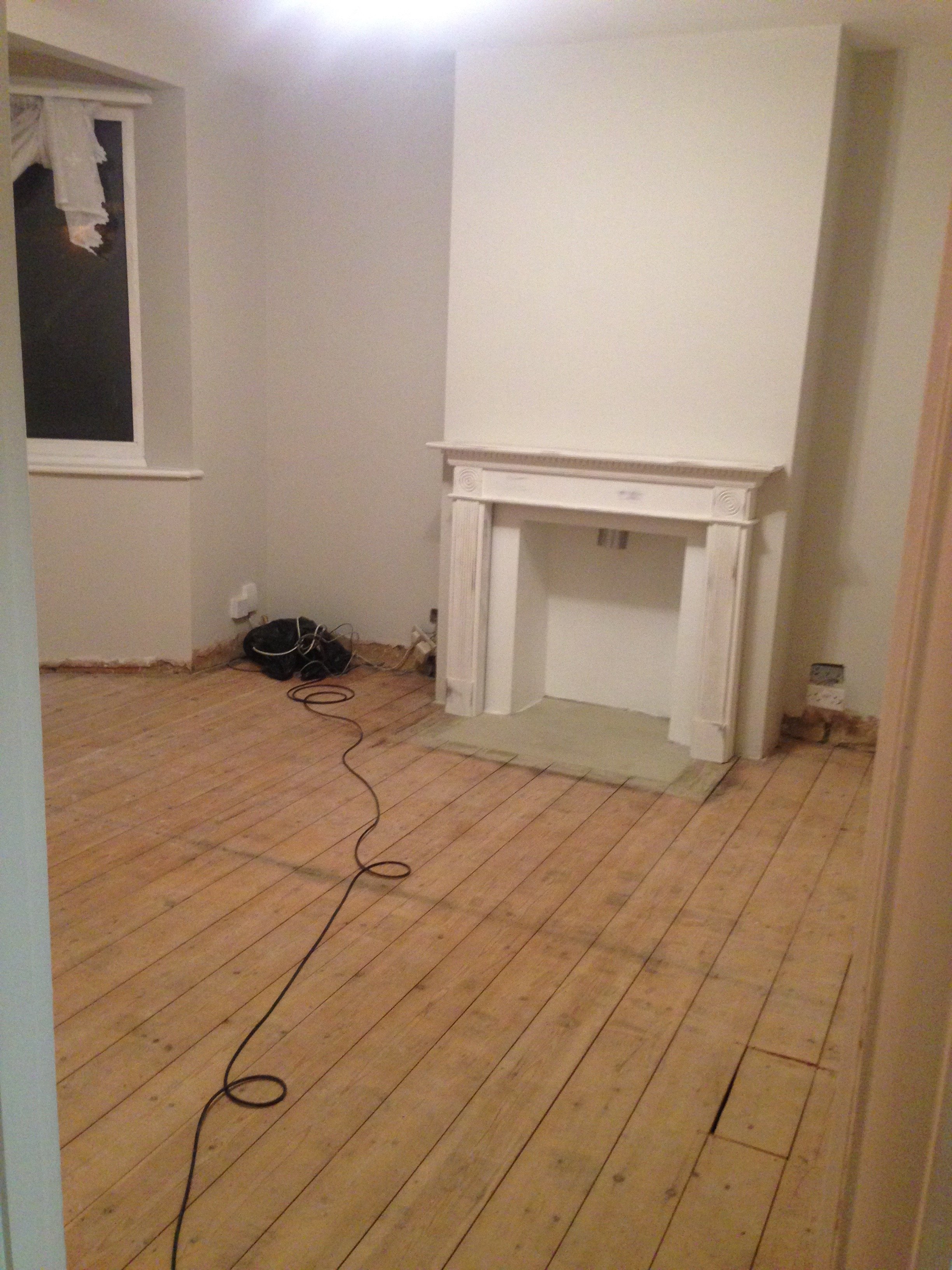Living room interior design - laying the new flooring