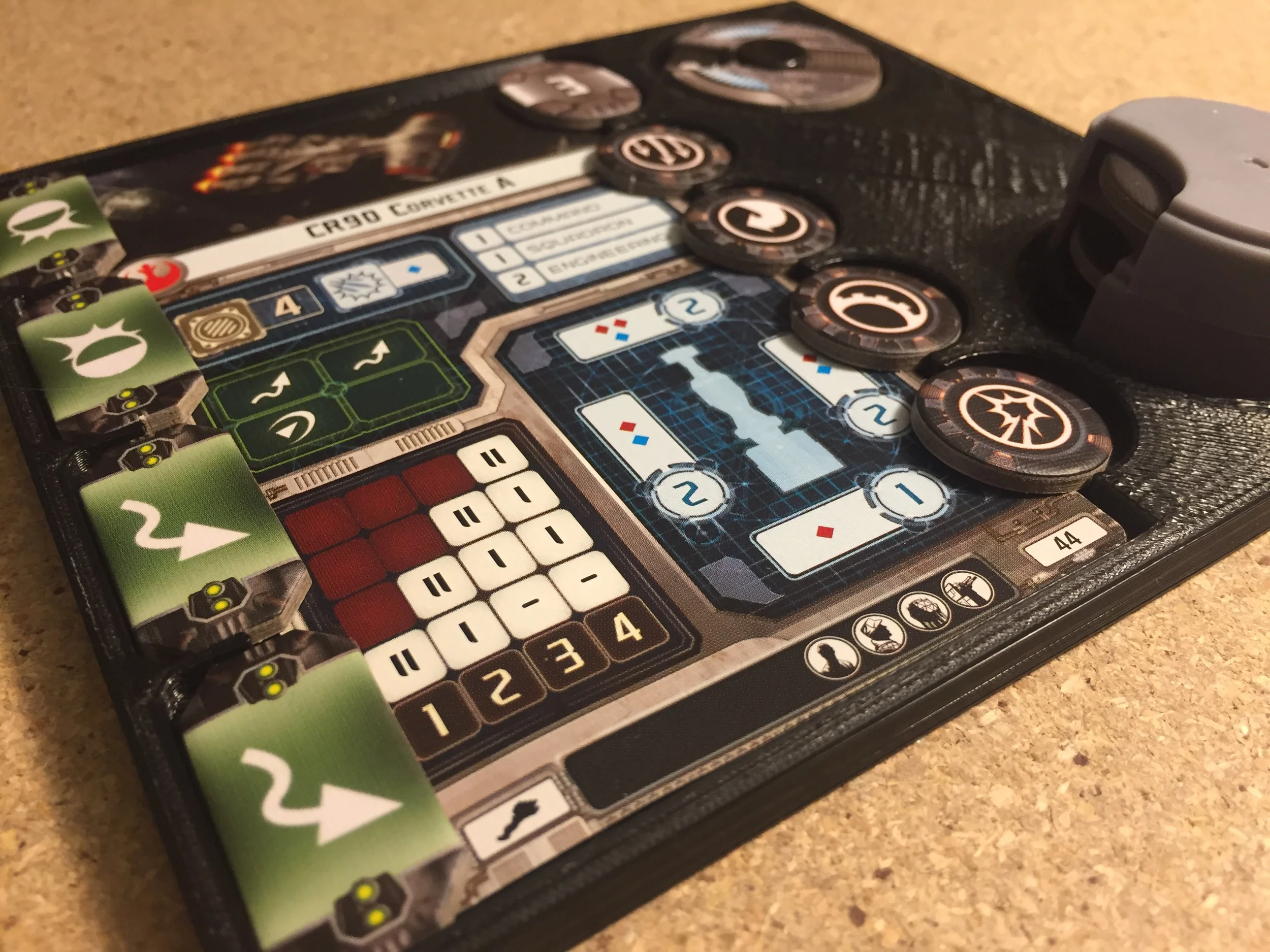 This is an early prototype of a ship card and token tray for Star Wars: Armada miniatures strategy game. I am exploring manufacturing options based on the interest of people who have seen it.