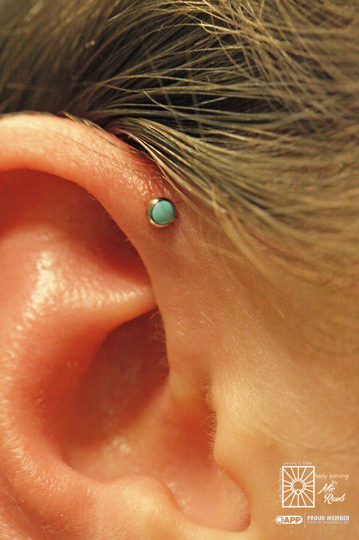 Fresh forward helix piercing wearing a titanium and turquoise piece from NeoMetal. Such a cutie!