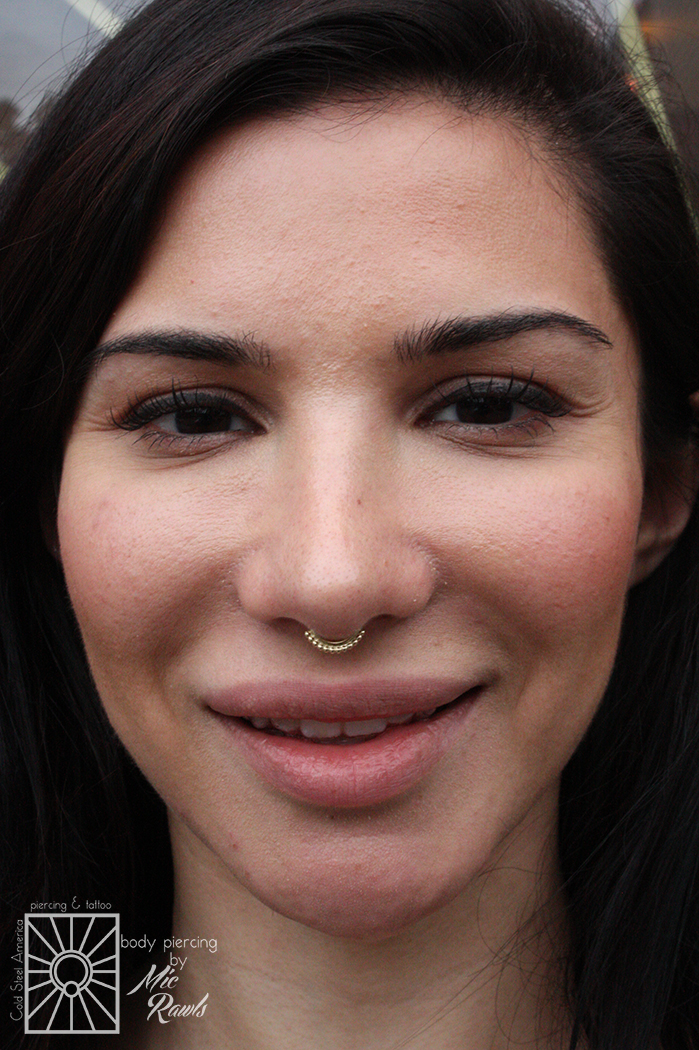 Mic did this piercing about 4 months ago, and this lovely young lady came back to us to upgrade to one of these gorgeous solid 14 karat yellow gold “Latchmi” continuous rings from Body Vision Los Angeles. Looks great!