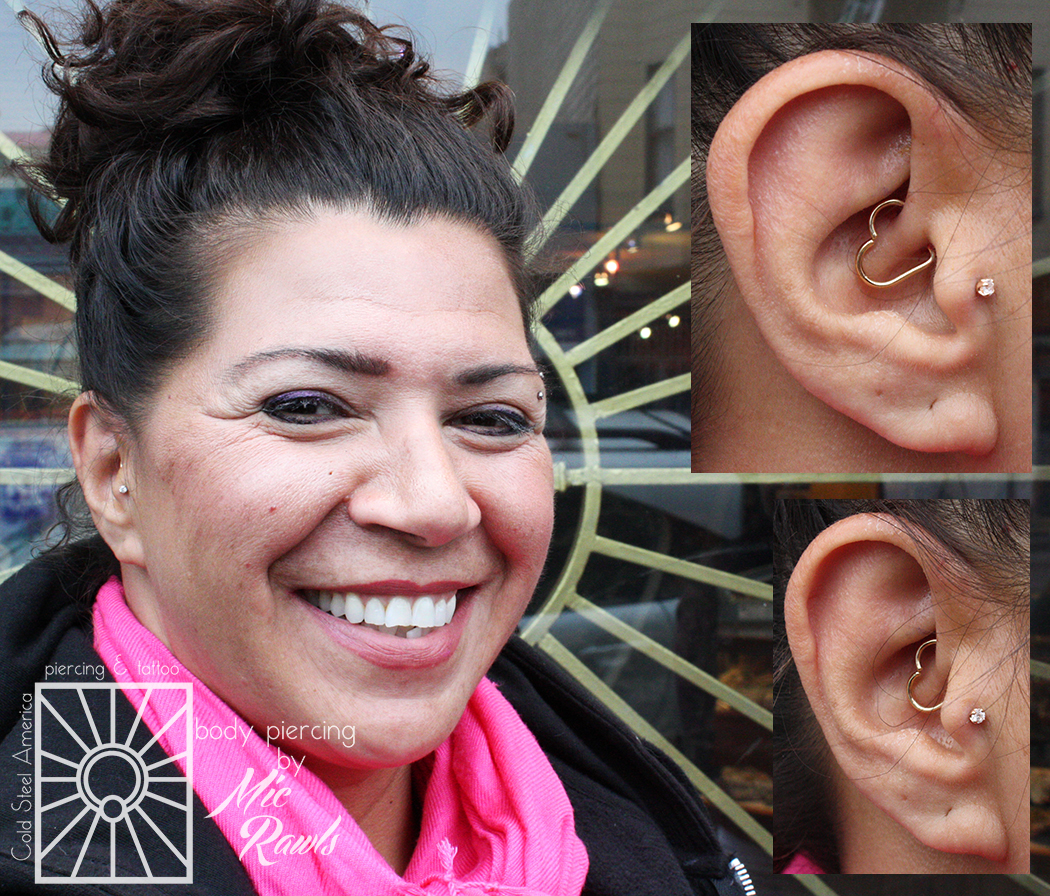 Mic pierced this lovely woman’s daith with a solid 14 karat Yellow Gold heart ring from Body Vision Los Angeles the other day, and it looks so fantastic on her! And we didn’t do her tragus piercing, but we did also get to upgrade her to a titanium push-pin barbell with a 2.5mm cz set in solid 14 karat Yellow Gold from NeoMetal. Yay for gold!