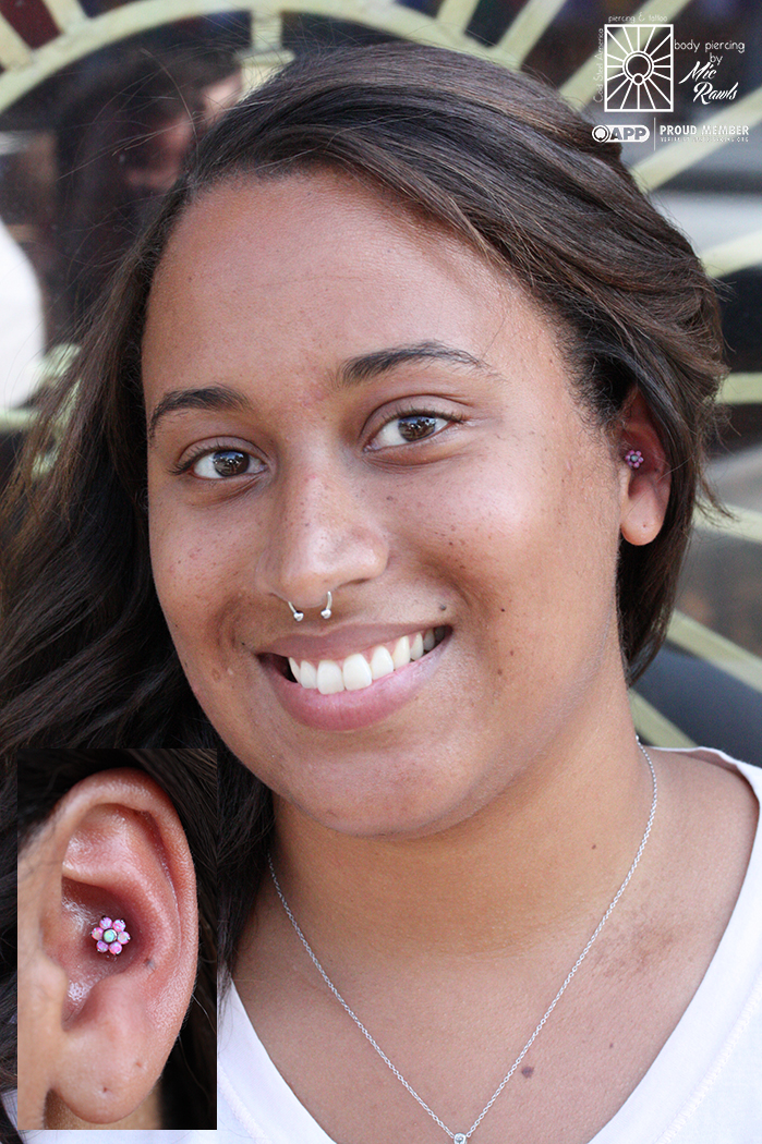 Fresh conch piercing done by Mic the other day, with a fantastic synthetic Opal flower end from Industrial Strength. Such a fun jewelry choice!