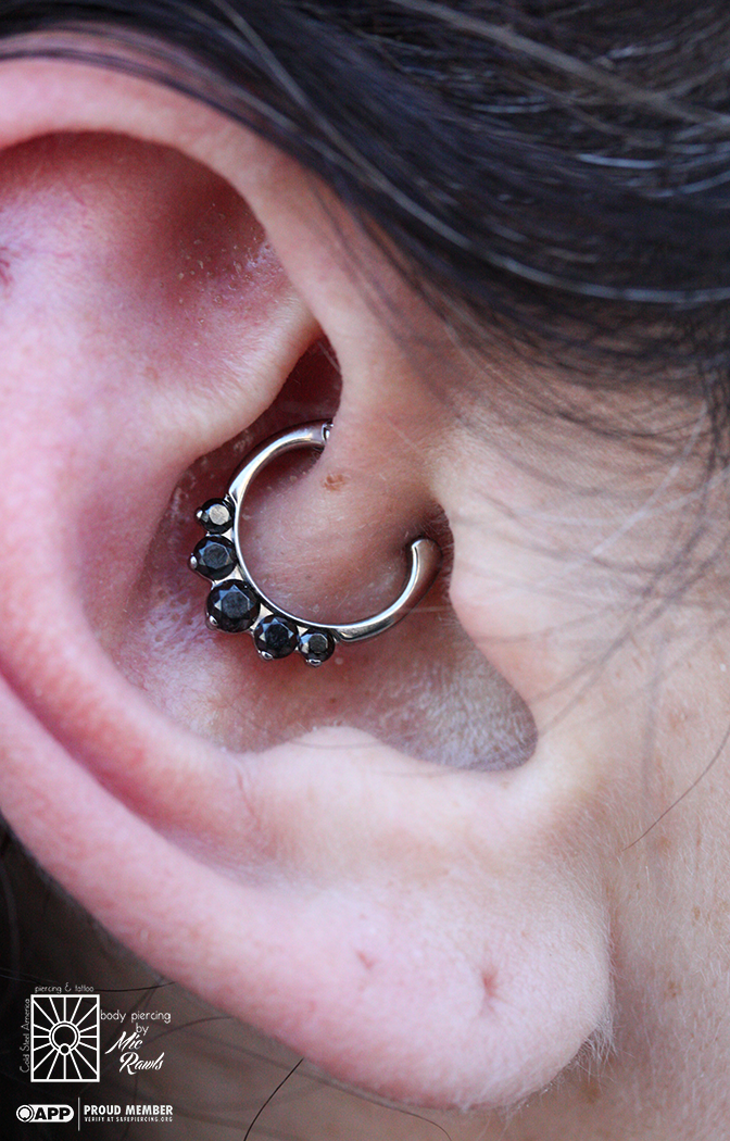 Healed daith piercing that recently came back for a jewelry upgrade! Such a great choice with this beautiful titanium and Onyx cz clicker from Industrial Strength.