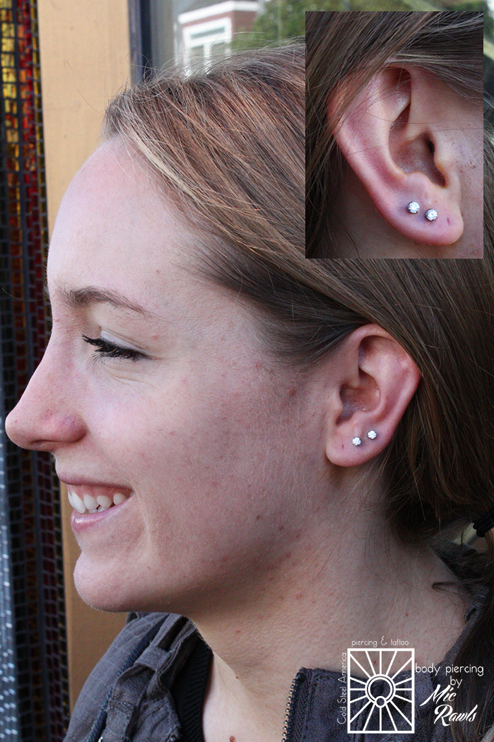 Double the fun! Fresh paired earlobe piercings wearing 18g (1mm) implant-grade titanium push-pin barbells with 3mm prong-set cubic zirconias from NeoMetal.