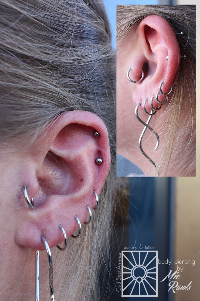 Two fresh helix piercings done on a wonderful client, wearing 18g (1mm) titanium jewelry from NeoMetal. Mic had to place these piercings around existing scar tissue, and we think they came out fantastically!