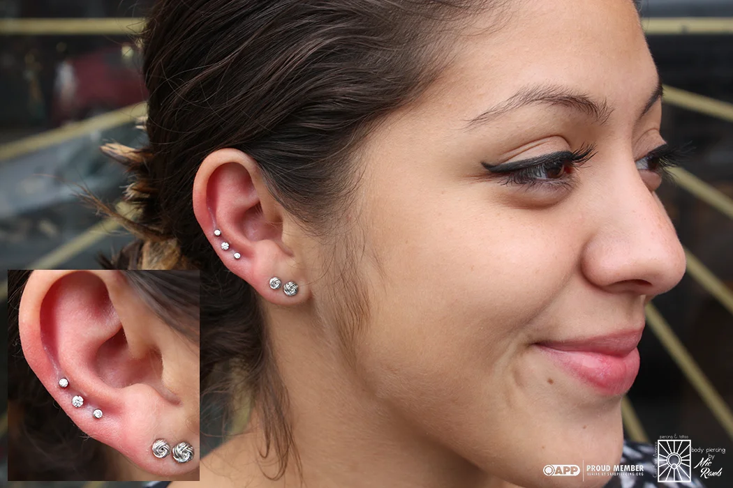 Some fresh triple helix piercings Mic got to do for this lovely young lady the other day. We chose the combination of a 2.5mm prong-set cz nestled between 2mm bezel-set cz’s, and we think it looks so cute on her! Jewelry from NeoMetal.