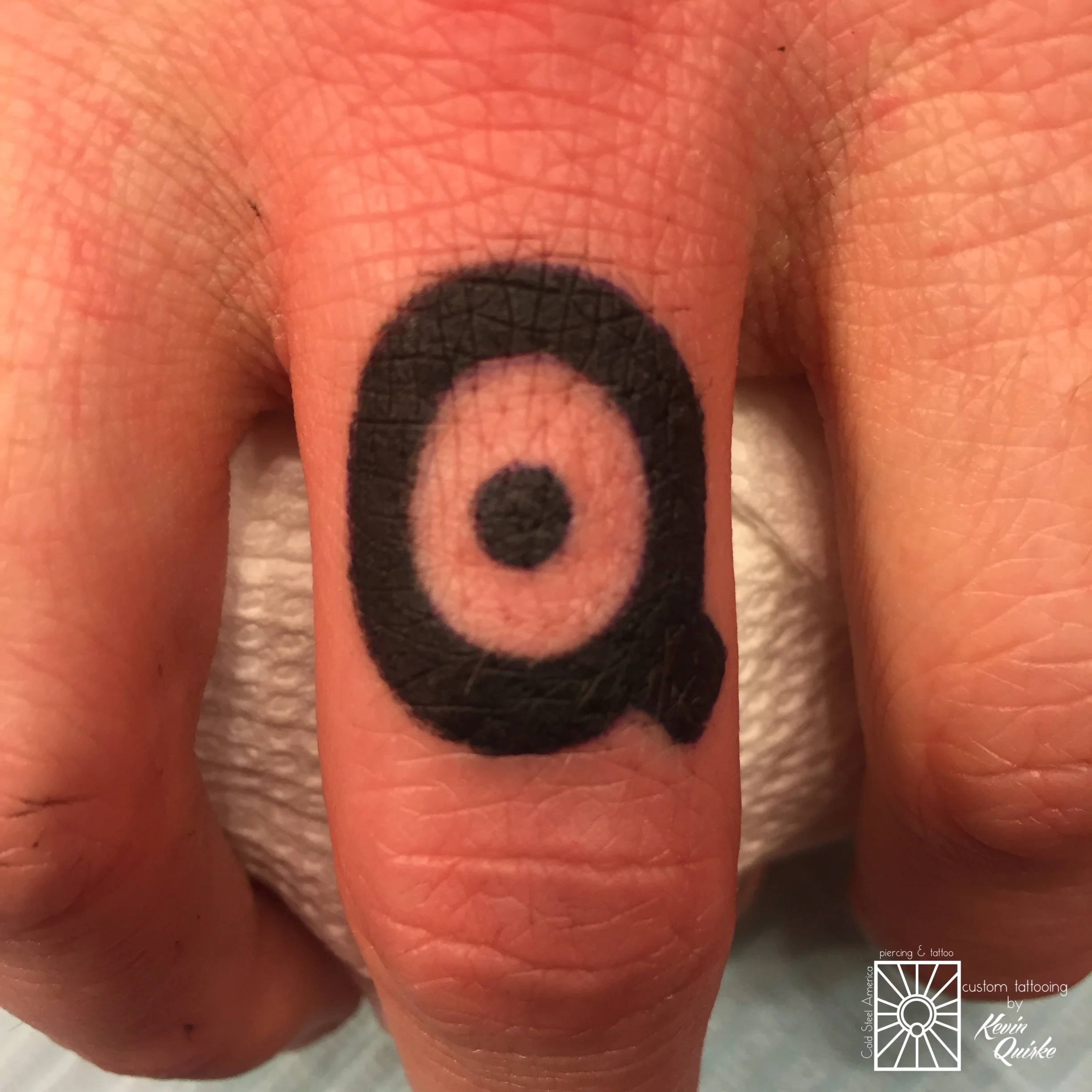 kevin-finger symbol-w.JPG