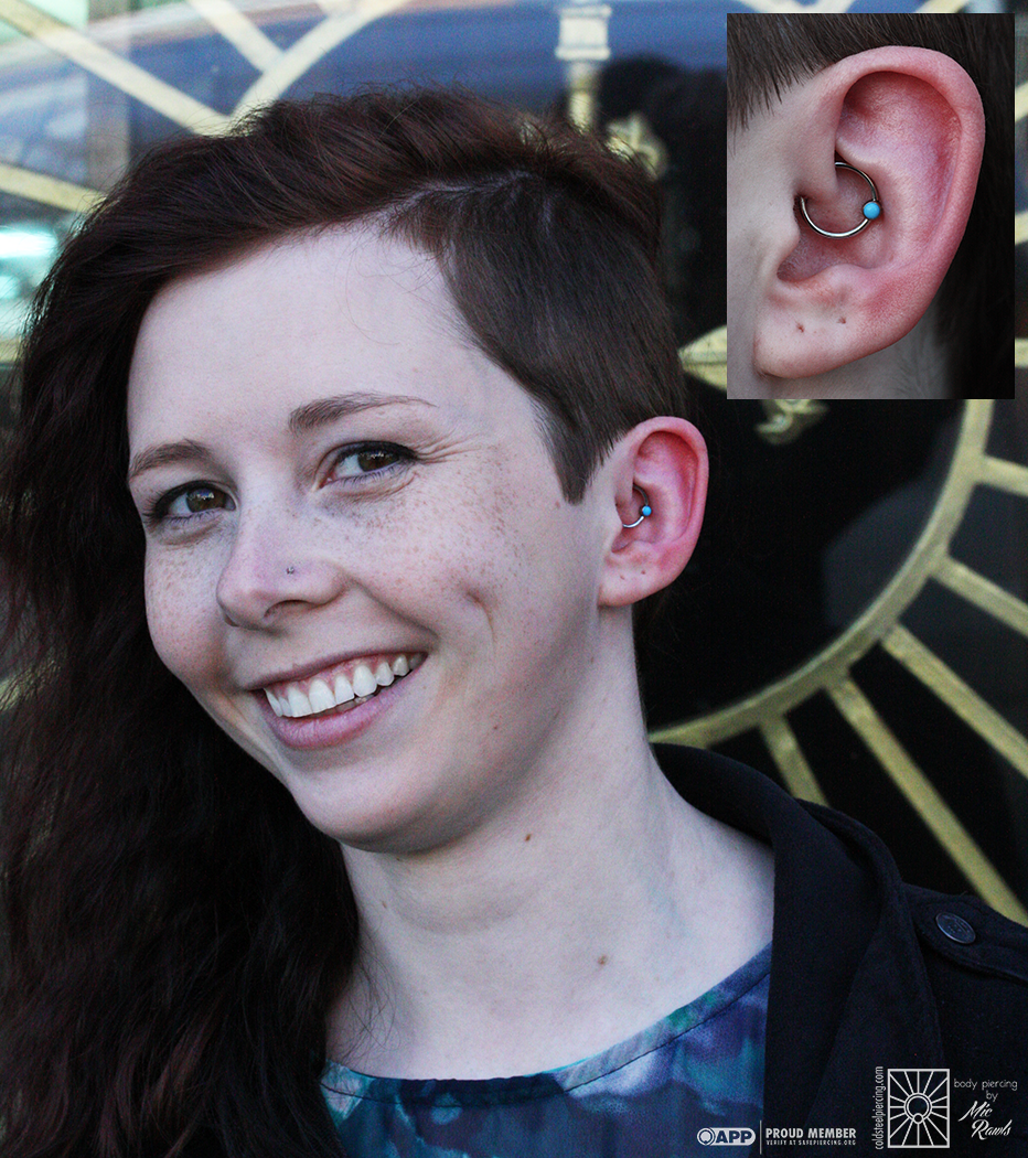 Fresh daith piercing wearing a super simple and cute implant-grade steel captive ring with Turquoise bead! Jewelry from Industrial Strength.