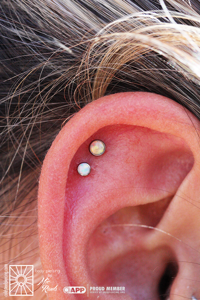Super cute little set of fresh helix piercings, wearing a 4mm synthetic Pink Opal and a 3mm synthetic White Opal from NeoMetal. What a fun combo!