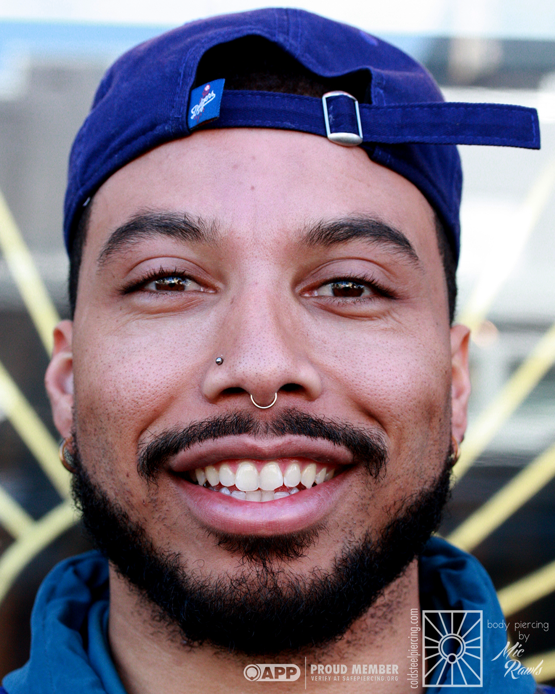 This handsome fellow had his septum pierced by us a couple of years ago, and we were so happy to see that it had healed beautifully and was more than ready for the switch to this perfectly fitted yellow gold continuous ring from Body Vision Los Angeles. 