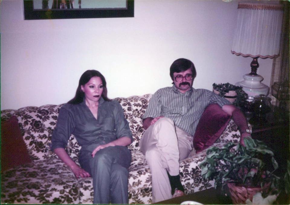 I love this picture. My parents look thrilled here. What is their body language saying?