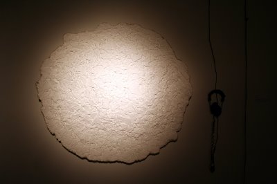 Ouch A paper casting of a pile of broken glass with the sound of glass breaking. cast paper and fiberglass, with audio 10 x 48 x 48” installation in Miller Gallery, PA 2007