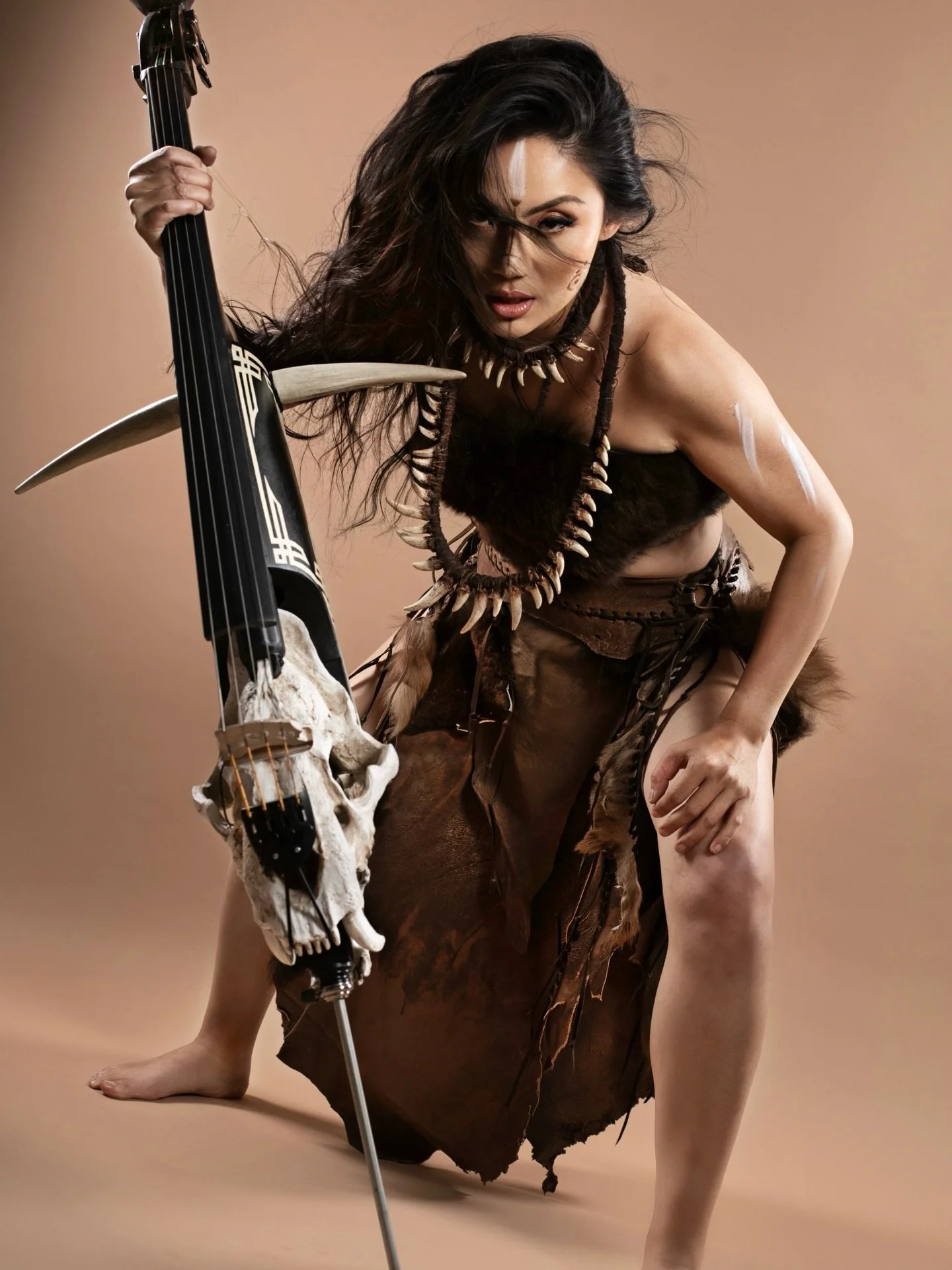 Hands wide open, eye turned blind
Something ancient breathes through my spine