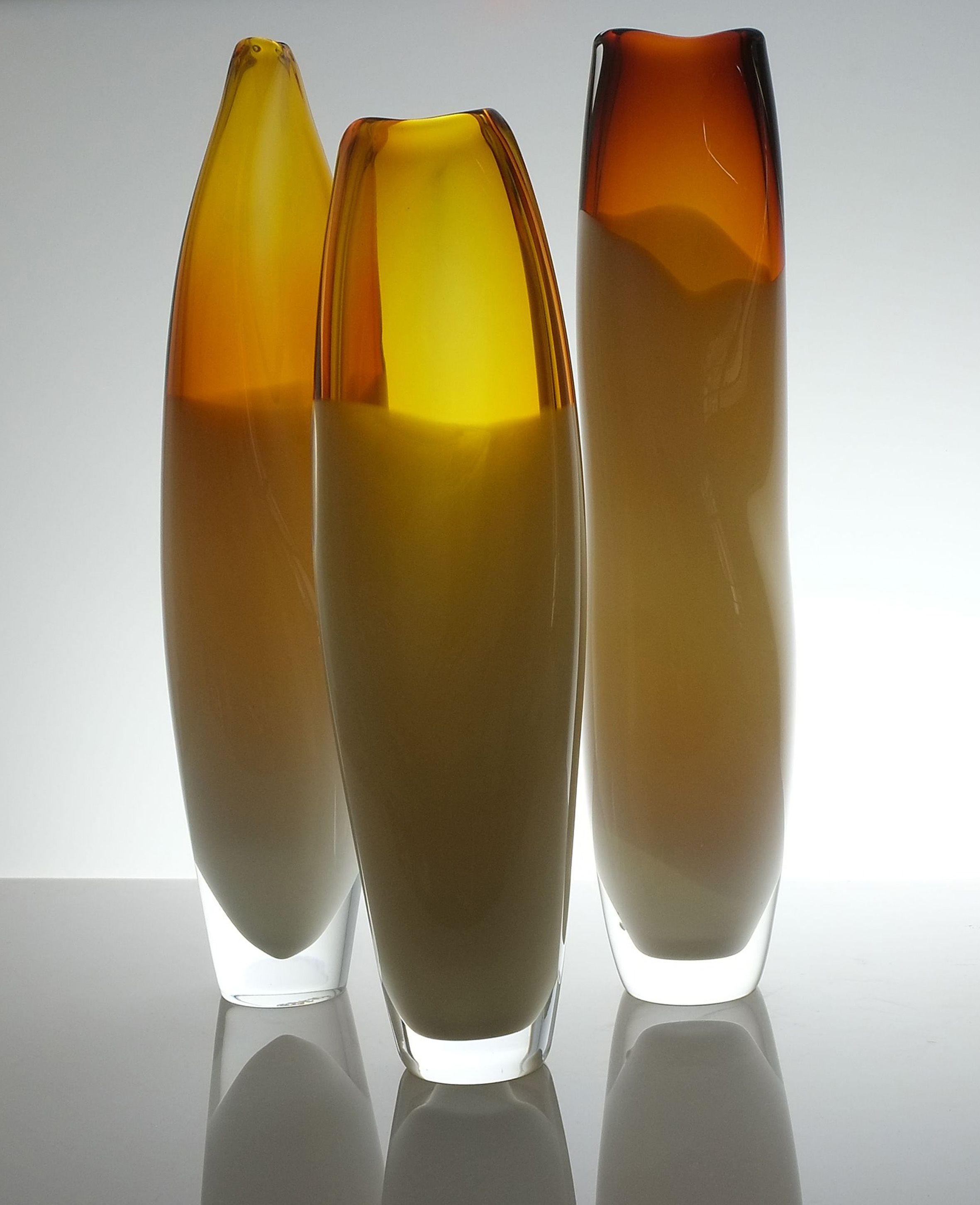 Tall Amber Curved Vessels