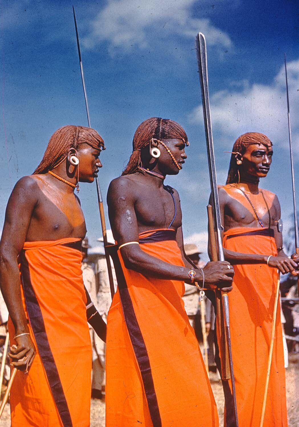 Metz 10 - 1959 - Three Native dudes in red - Metz35 - 8 M.jpg