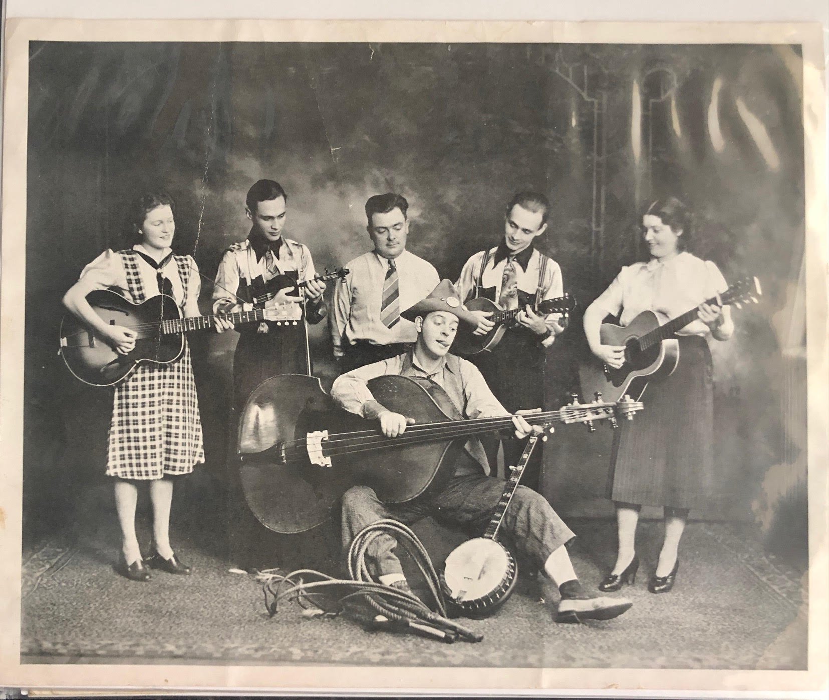 Lynch Collection - Uncle Jack Mary Lou playing bass on lap - 5-23-2022.jpg
