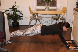 Plank (sliding hands forwards)