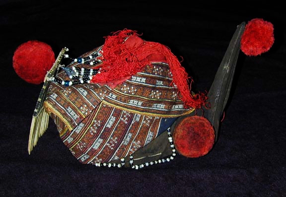 Yao woman's headdress and bone comb, Guangxi, China, early 20th century. 