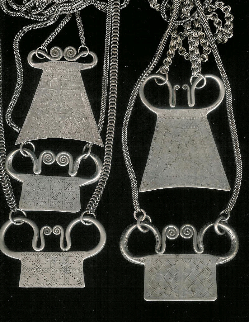 Hmong silver pendants, Siam or Laos, turn-of-the-century.