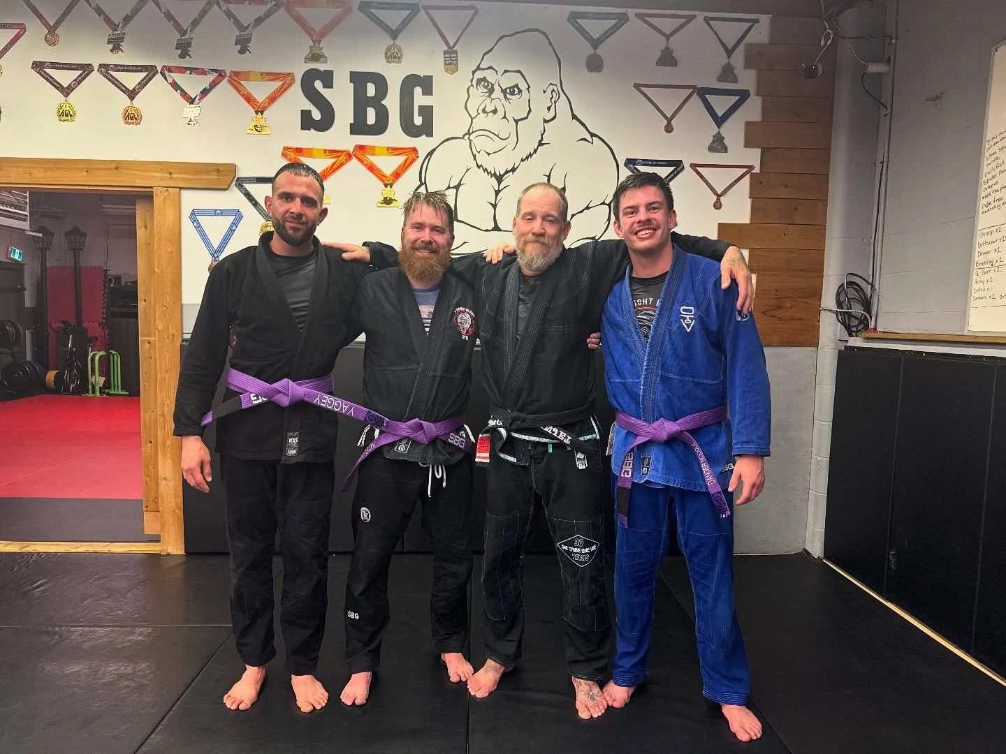 Congratulations to our newest purple belts.  Three good men with completely different games. SBG is a better place with you as tribe. Shout out to our students who received stripes on their own respective belts. Viva SBG! #bjj #sbgedmotonbjj #jiujits