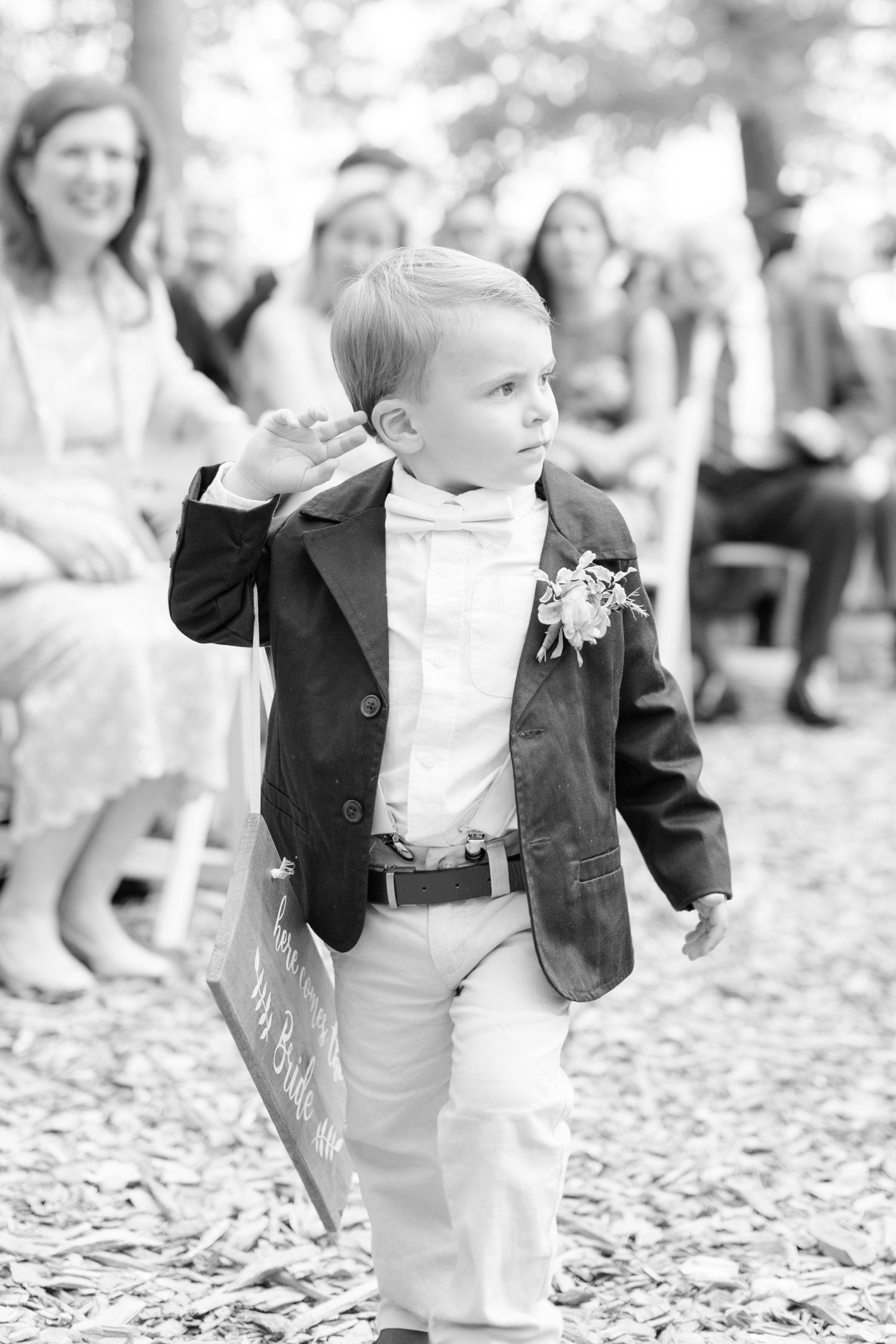  He didn't quite hold the sign right, but he still looked adorable walking down the aisle!&nbsp; 