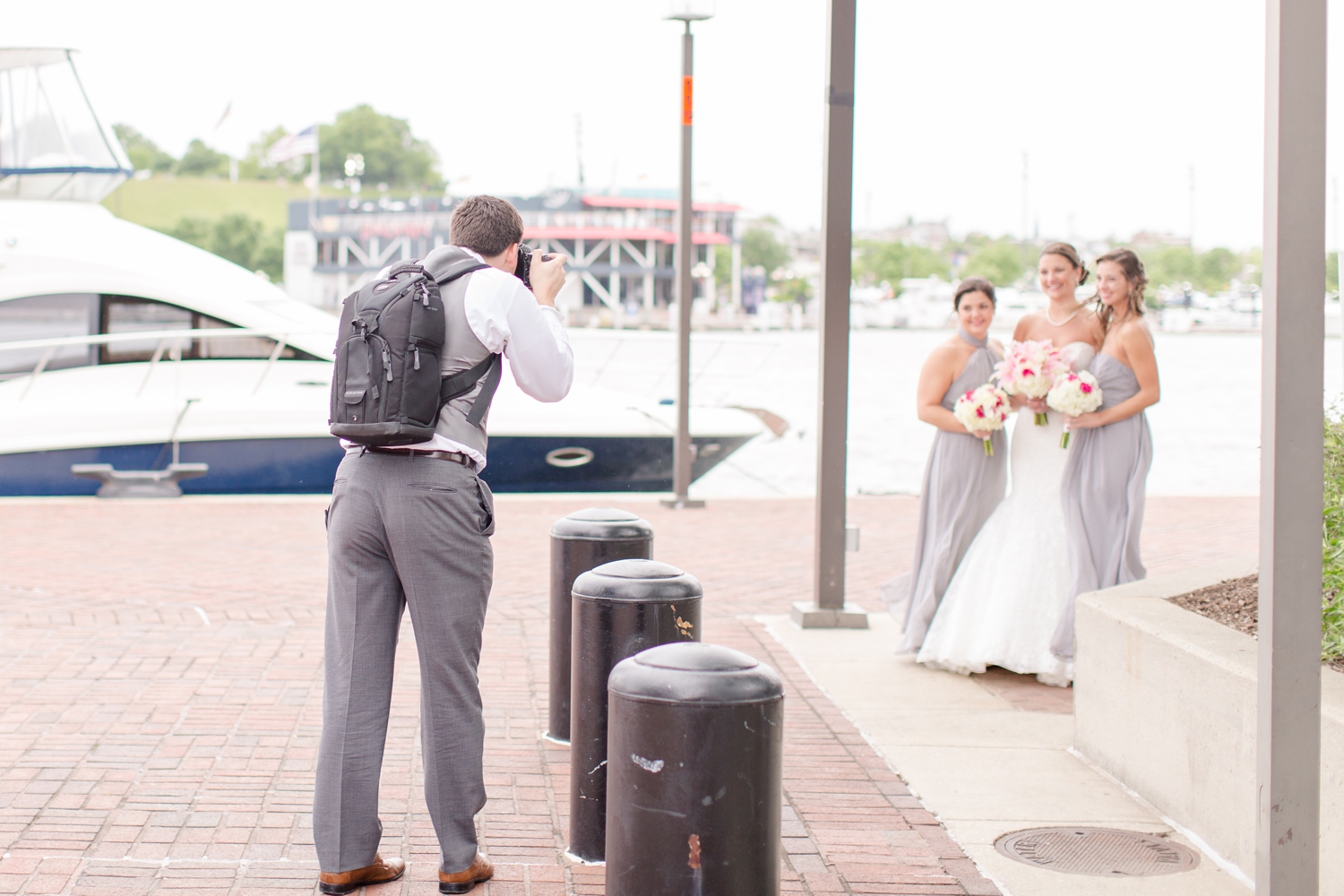  One way that we save time on the wedding day is by tag-teaming the bridal party photos! Kevin will take individual shots of each bridesmaid with the bride/small groupings while I take photos of all the groomsmen together. Love having a few more minu