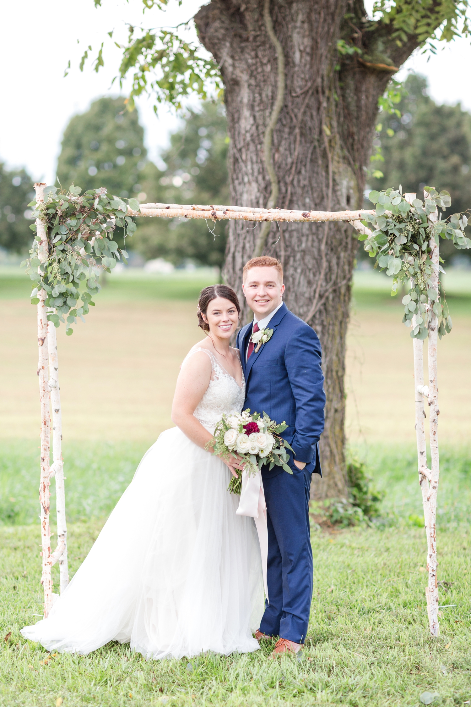  This was the arch Mark and Shelby were planning on getting married under until it rained and they had to move the ceremony inside. We had to get some pictures under it because it was so cute! 
