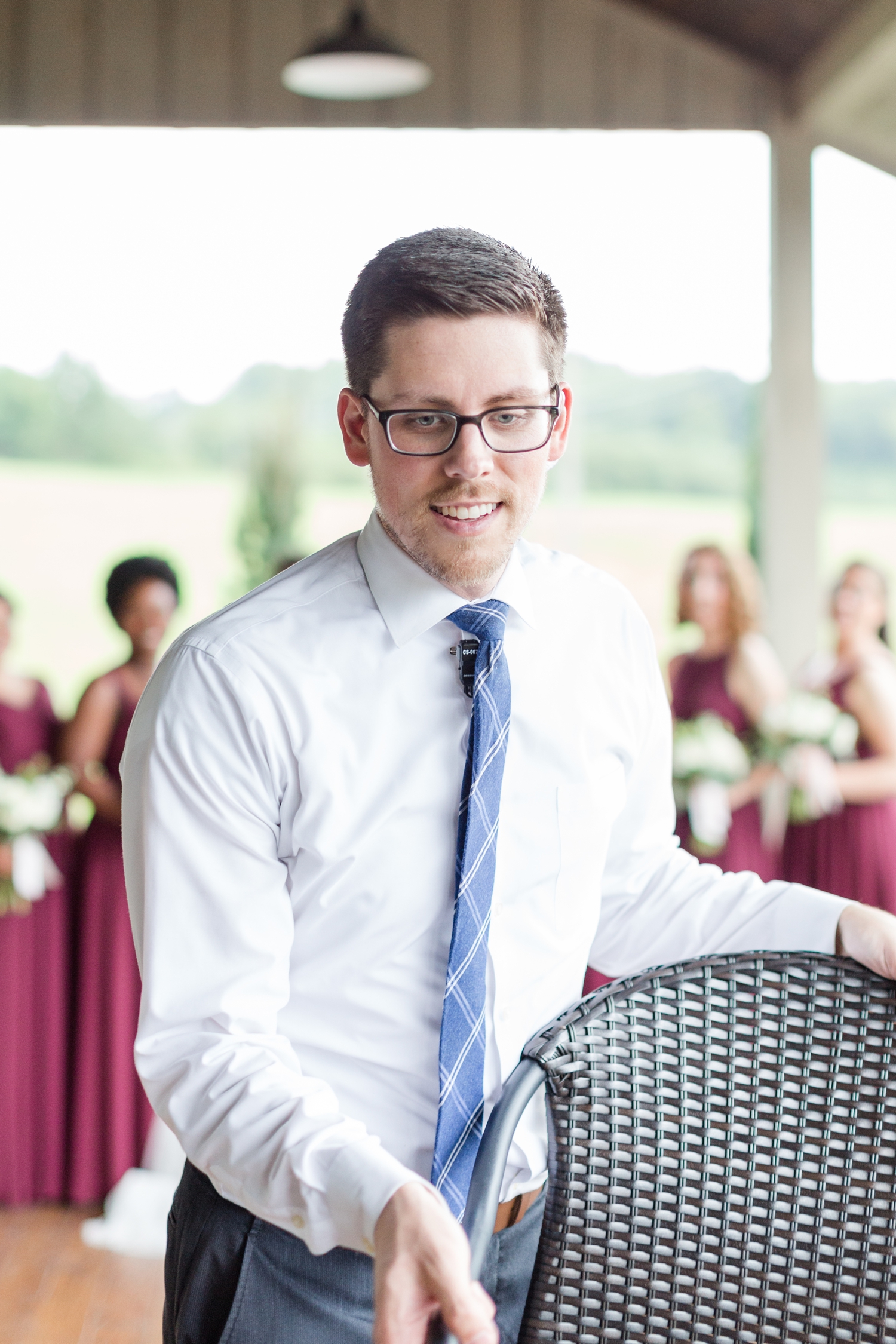  It rained during the beginning of Mark and Shelby’s wedding so we took the bridal party photos under the deck. A big thanks to Kevin for moving all of the chairs on the deck to make room for the everyone in the photo! 