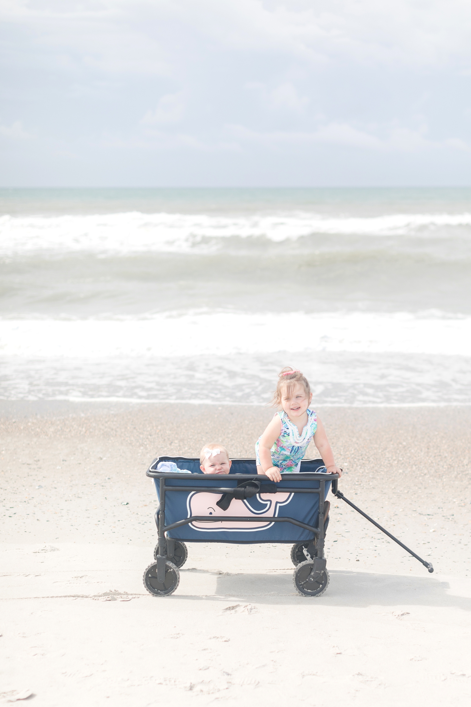  We bought a beach cart this year and this was the other amazing and necessary piece that we used everyday! It was nice because the kids can ride in it or you can put everything in there and not have to carry it all.  