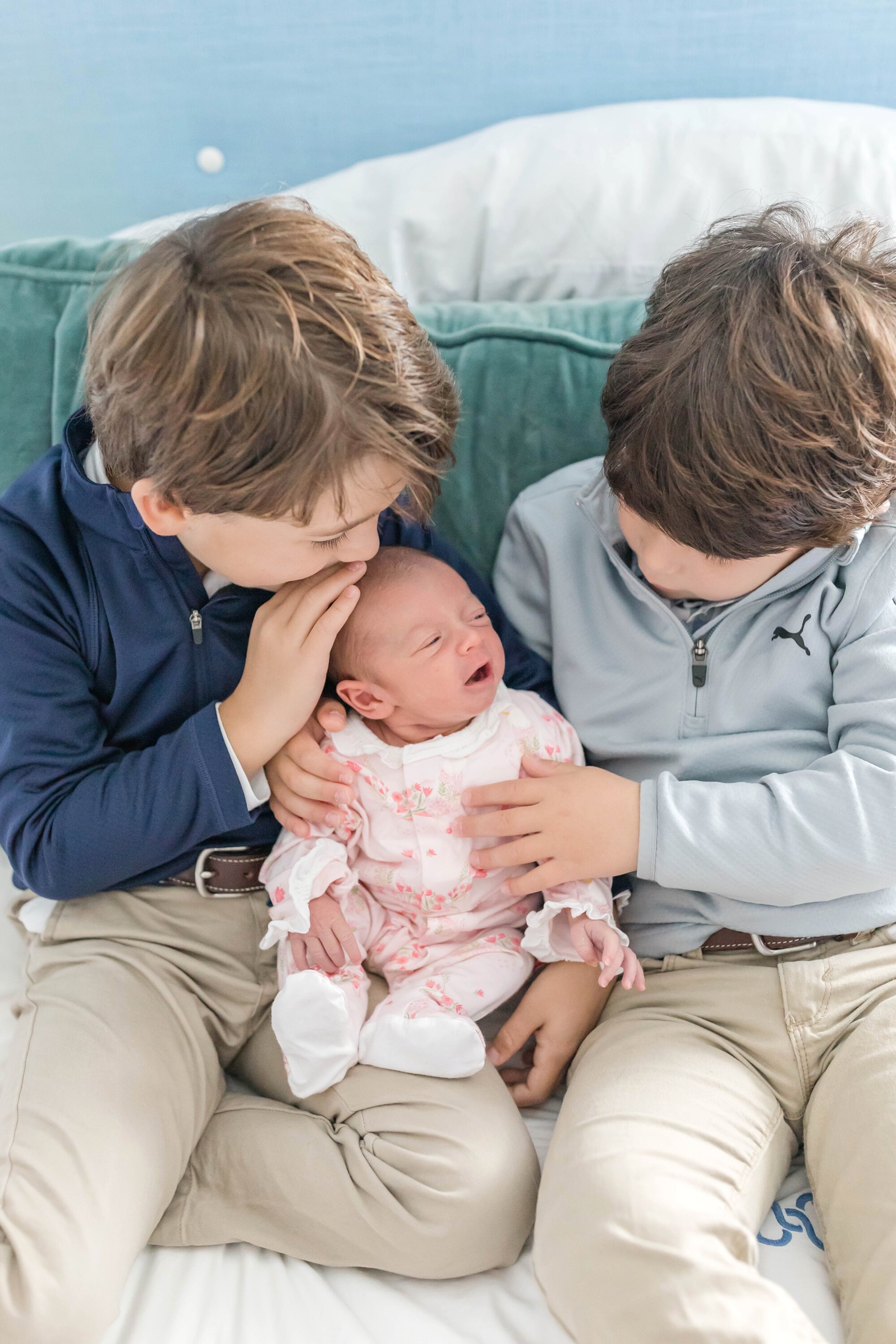  These boys are so adorable with baby Emilia! 