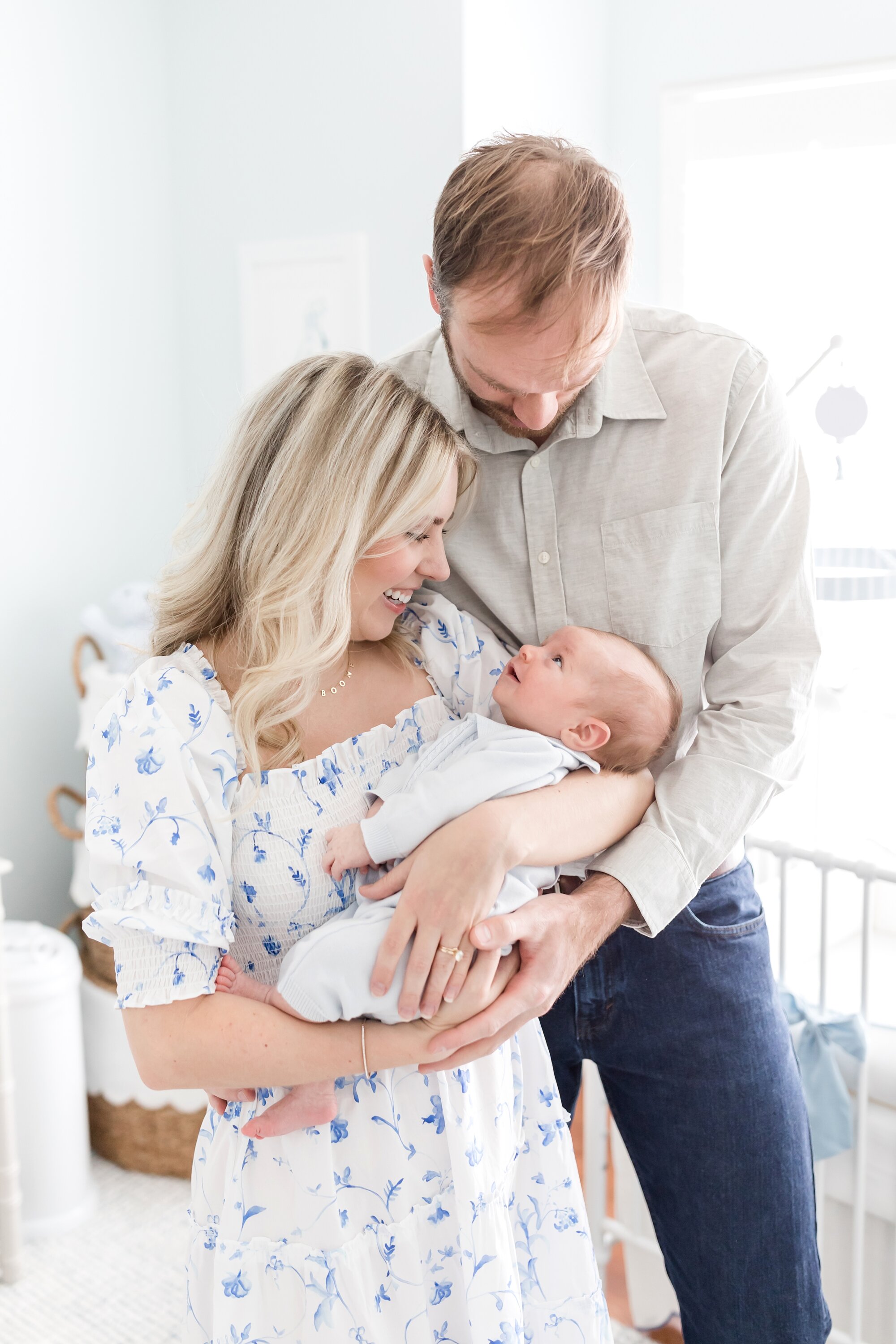  Love that little smile and Mom and Dad! 