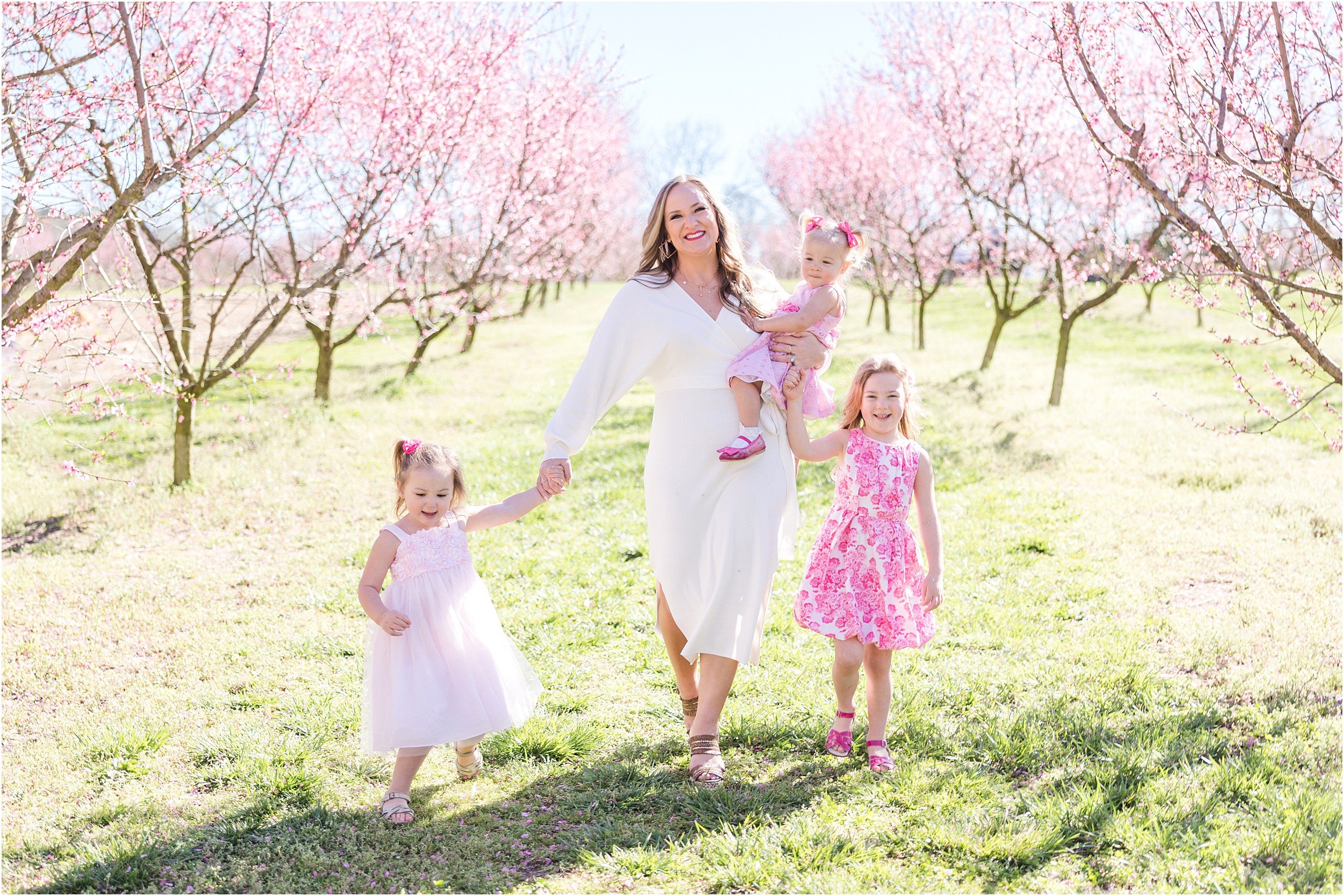 Hewetson Family 2023-52_Millstone-Orchard-peach-blossoms-Raleigh-family-photographer.jpg