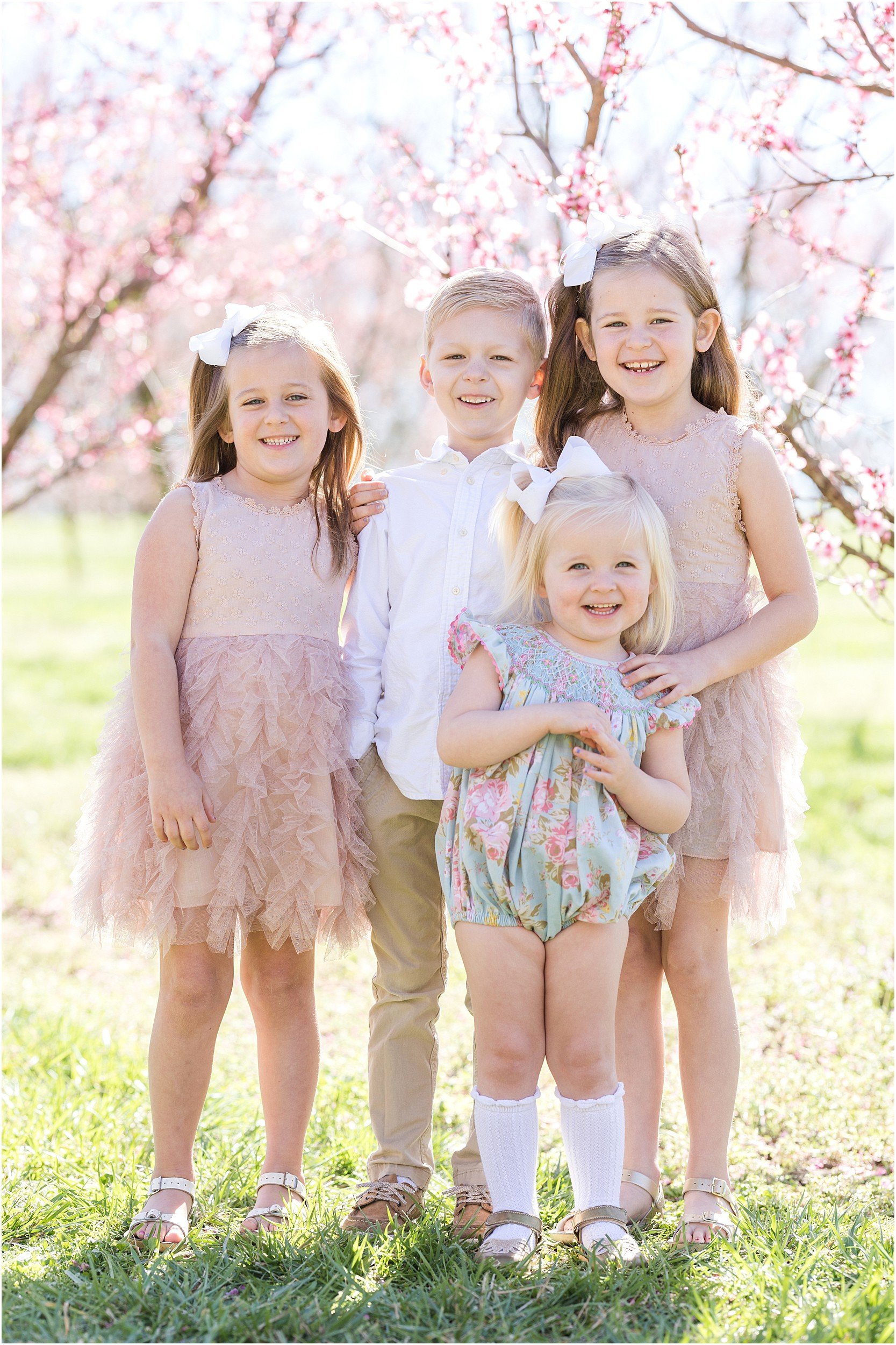 Wunderink Family Spring 2023-4_Millstone-Orchard-peach-blossoms-Raleigh-family-photographer.jpg