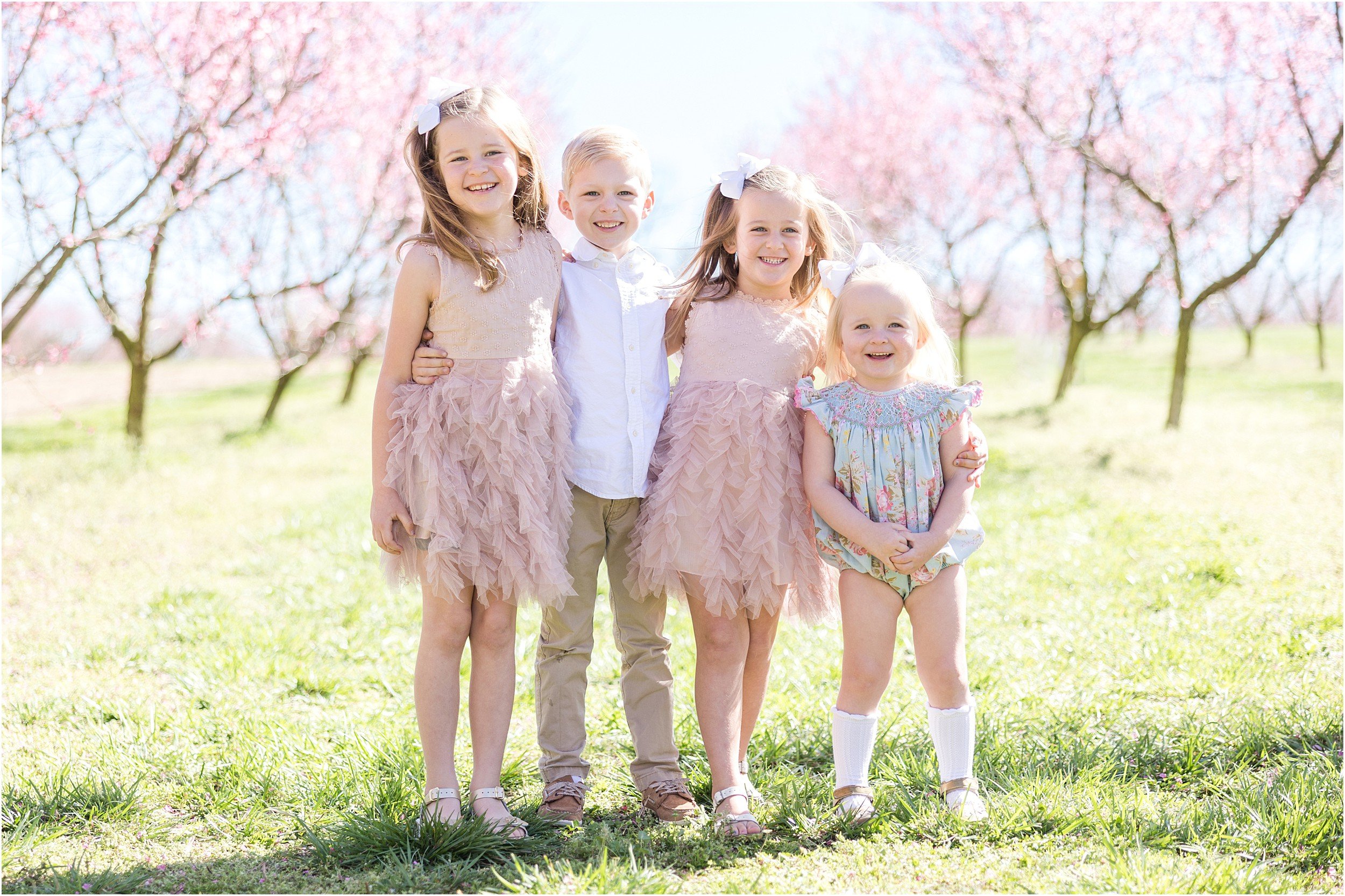 Wunderink Family Spring 2023-23_Millstone-Orchard-peach-blossoms-Raleigh-family-photographer.jpg
