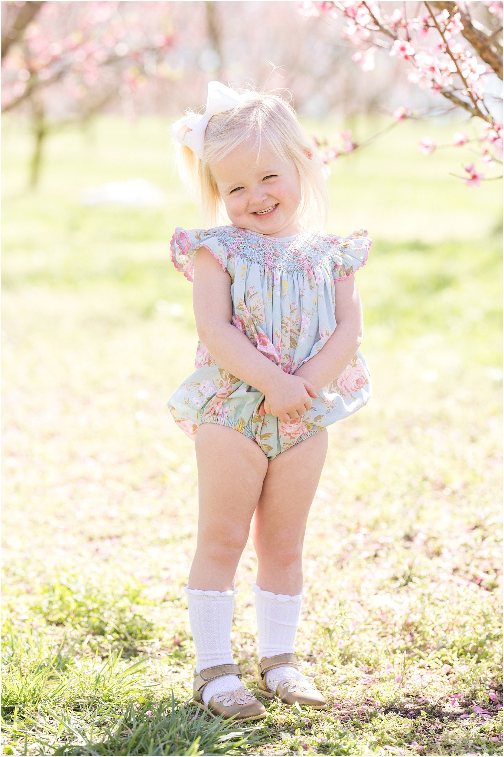 Wunderink Family Spring 2023-84_Millstone-Orchard-peach-blossoms-Raleigh-family-photographer.jpg